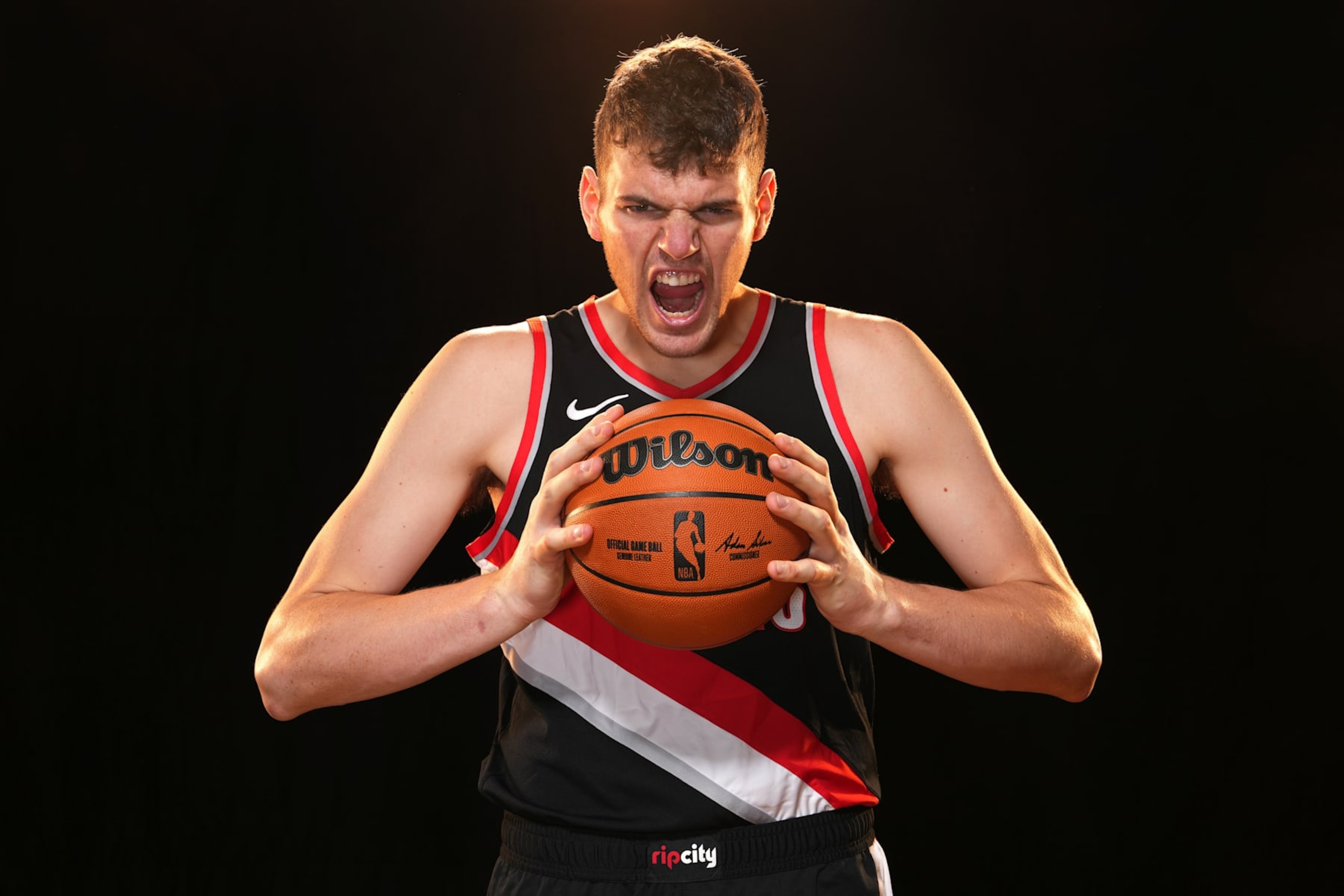 LAS VEGAS, NV - JULY 17: Donovan Clingan #23 of the Portland Trail Blazers poses for a portrait during the 2024 NBA Rookie Photo Shoot on July 17, 2024 at the University of Nevada, Las Vegas campus in Las Vegas, Nevada. NOTE TO USER: User expressly acknowledges and agrees that, by downloading and/or using this Photograph, user is consenting to the terms and conditions of the Getty Images License Agreement. Mandatory Copyright Notice: Copyright 2024 NBAE (Photo by Jeff Bottari/NBAE via Getty Images)