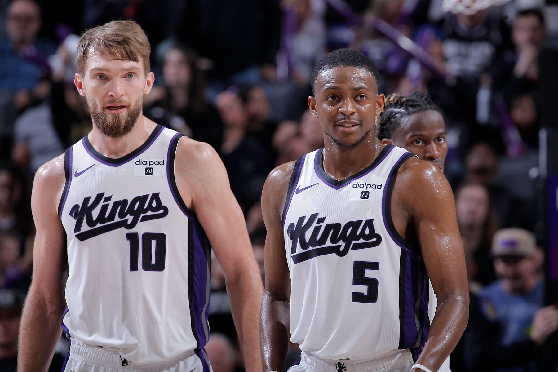 SACRAMENTO, CA - MARCH 29: Domantas Sabonis #10 and De'Aaron Fox #5 of the Sacramento Kings look on during the game against the Dallas Mavericks on March 29, 2024 at Golden 1 Center in Sacramento, California. NOTE TO USER: User expressly acknowledges and agrees that, by downloading and or using this photograph, User is consenting to the terms and conditions of the Getty Images Agreement. Mandatory Copyright Notice: Copyright 2024 NBAE (Photo by Rocky Widner/NBAE via Getty Images)