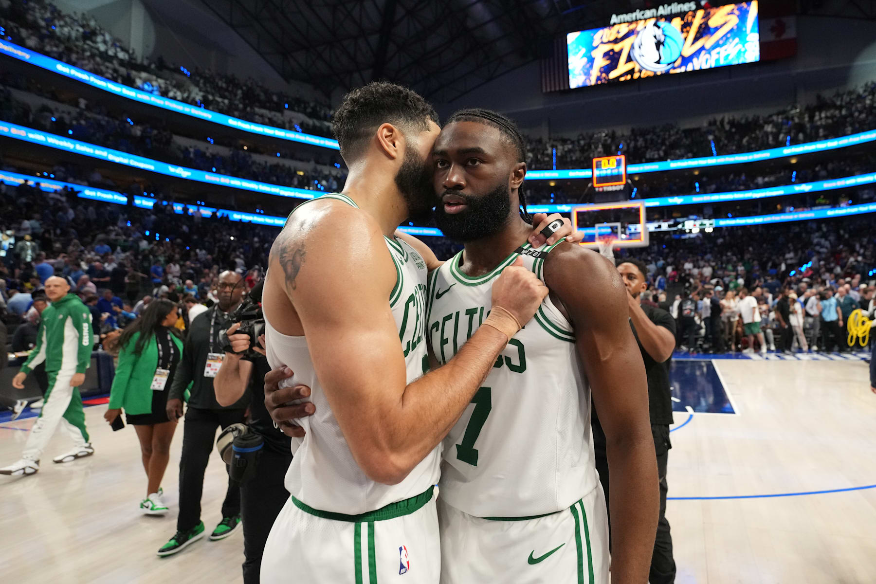 DALLAS, TX - JUNE 12: Jayson Tatum #0 and Jaylen Brown #7 of the Boston Celtics hug after the game against the Dallas Mavericks during Game 3 of the 2024 NBA Finals on June 12, 2024 at the American Airlines Center in Dallas, Texas. NOTE TO USER: User expressly acknowledges and agrees that, by downloading and or using this photograph, User is consenting to the terms and conditions of the Getty Images License Agreement. Mandatory Copyright Notice: Copyright 2024 NBAE (Photo by Jesse D. Garrabrant/NBAE via Getty Images)