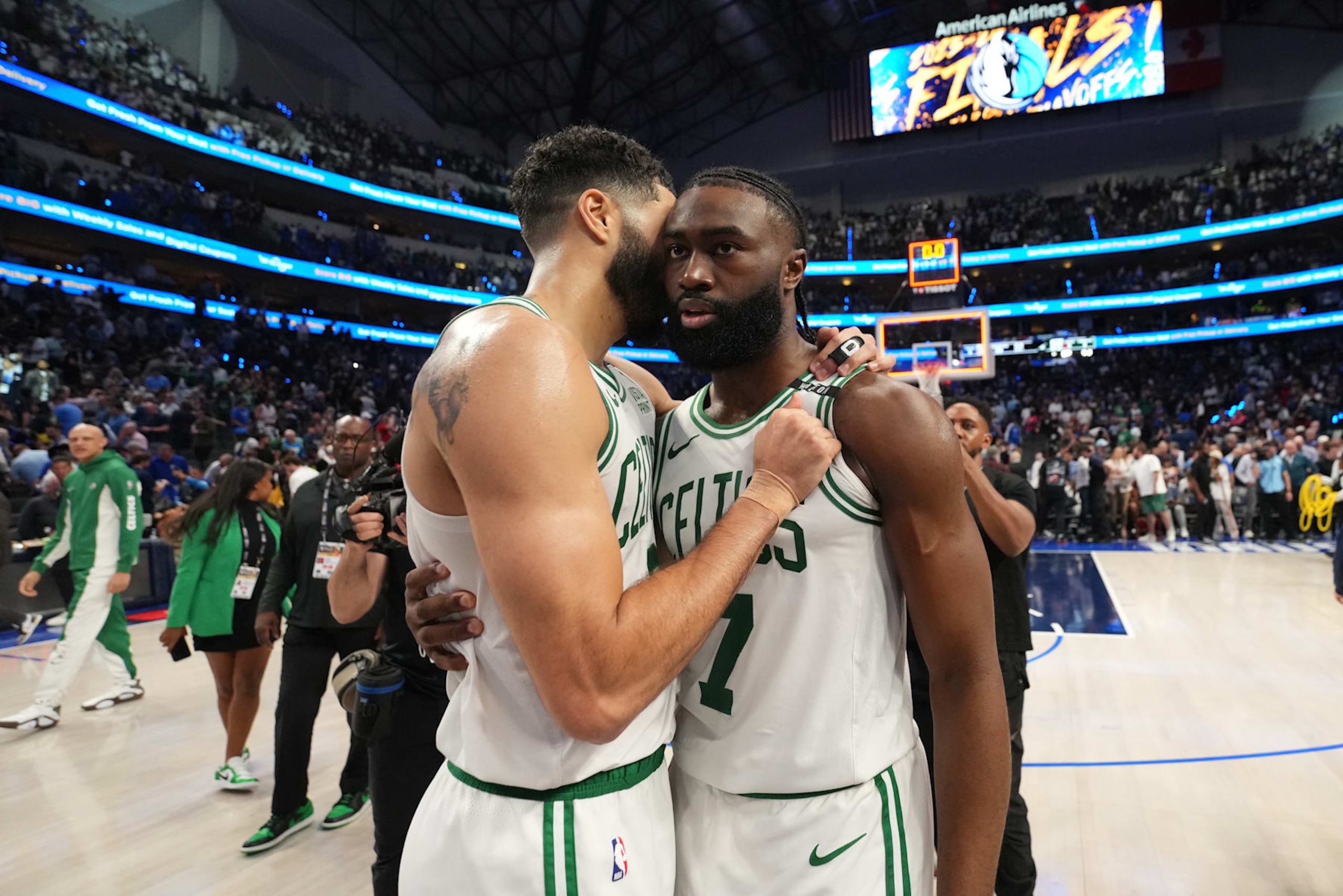 DALLAS, TX - JUNE 12: Jayson Tatum #0 and Jaylen Brown #7 of the Boston Celtics hug after the game against the Dallas Mavericks during Game 3 of the 2024 NBA Finals on June 12, 2024 at the American Airlines Center in Dallas, Texas. NOTE TO USER: User expressly acknowledges and agrees that, by downloading and or using this photograph, User is consenting to the terms and conditions of the Getty Images License Agreement. Mandatory Copyright Notice: Copyright 2024 NBAE (Photo by Jesse D. Garrabrant/NBAE via Getty Images)