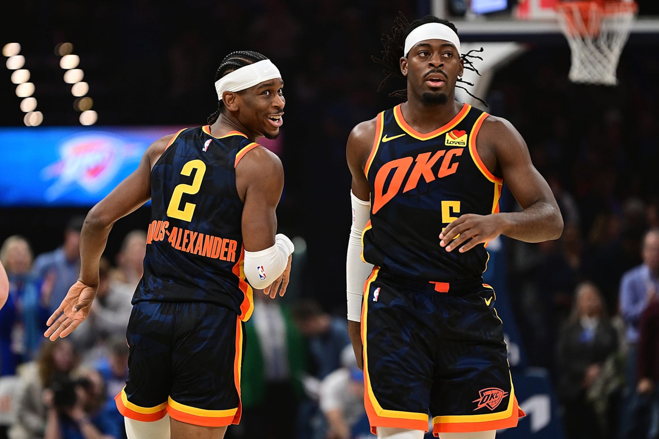 OKLAHOMA CITY, OKLAHOMA - FEBRUARY 11: Shai Gilgeous-Alexander #2 and Luguentz Dort #5 of the Oklahoma City Thunder run down the floor during the first half against the Sacramento Kings at Paycom Center on February 11, 2024 in Oklahoma City, Oklahoma. NOTE TO USER: User expressly acknowledges and agrees that, by downloading and or using this Photograph, user is consenting to the terms and conditions of the Getty Images License Agreement. (Photo by Joshua Gateley/Getty Images)