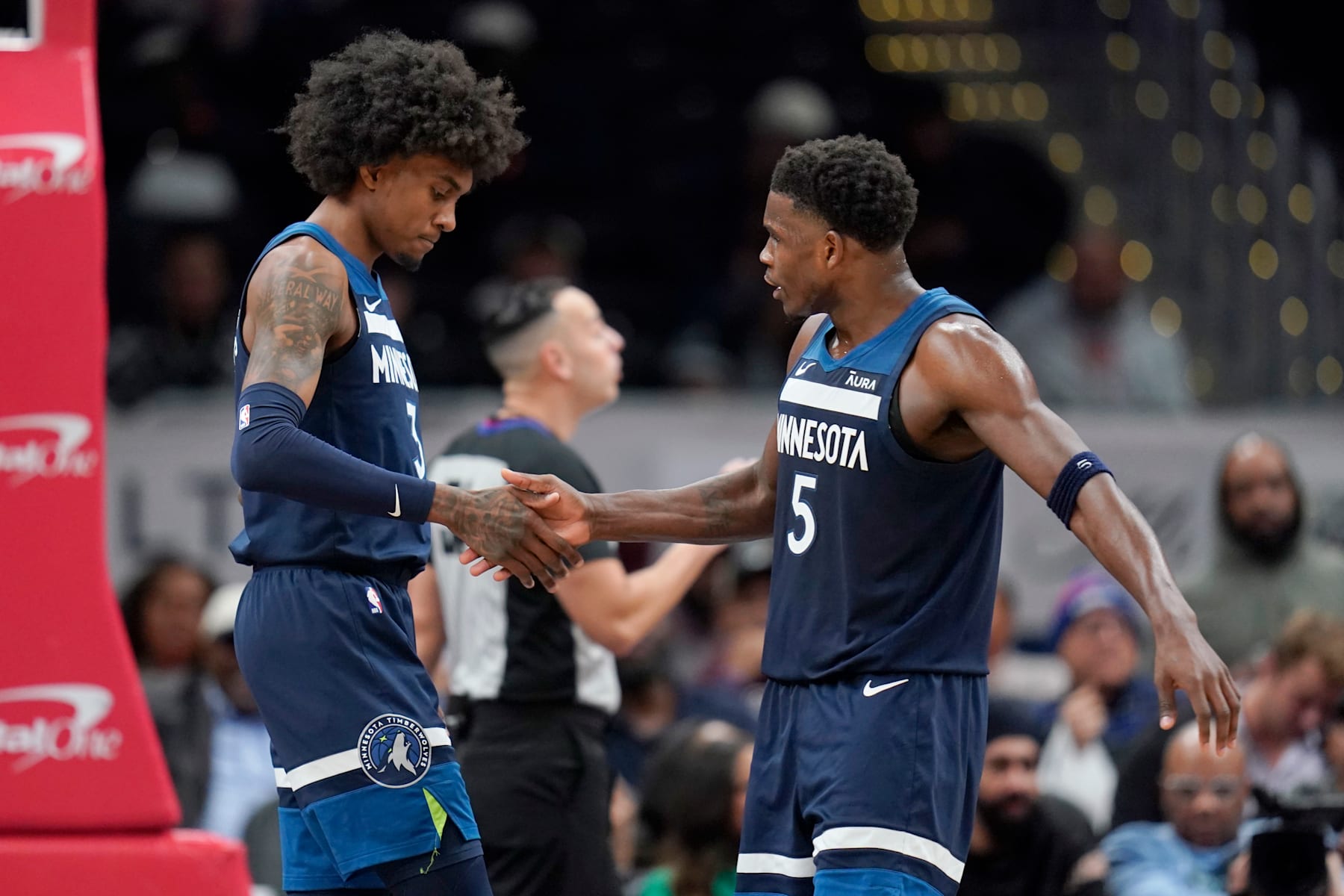 WASHINGTON, DC - JANUARY 24: Anthony Edwards #5 of the Minnesota Timberwolves celebrates with Jaden McDaniels #3 after scoring and drawing a foul against the Washington Wizards during the second half at Capital One Arena on January 24, 2024 in Washington, DC. NOTE TO USER: User expressly acknowledges and agrees that, by downloading and or using this photograph, User is consenting to the terms and conditions of the Getty Images License Agreement. (Photo by Jess Rapfogel/Getty Images)