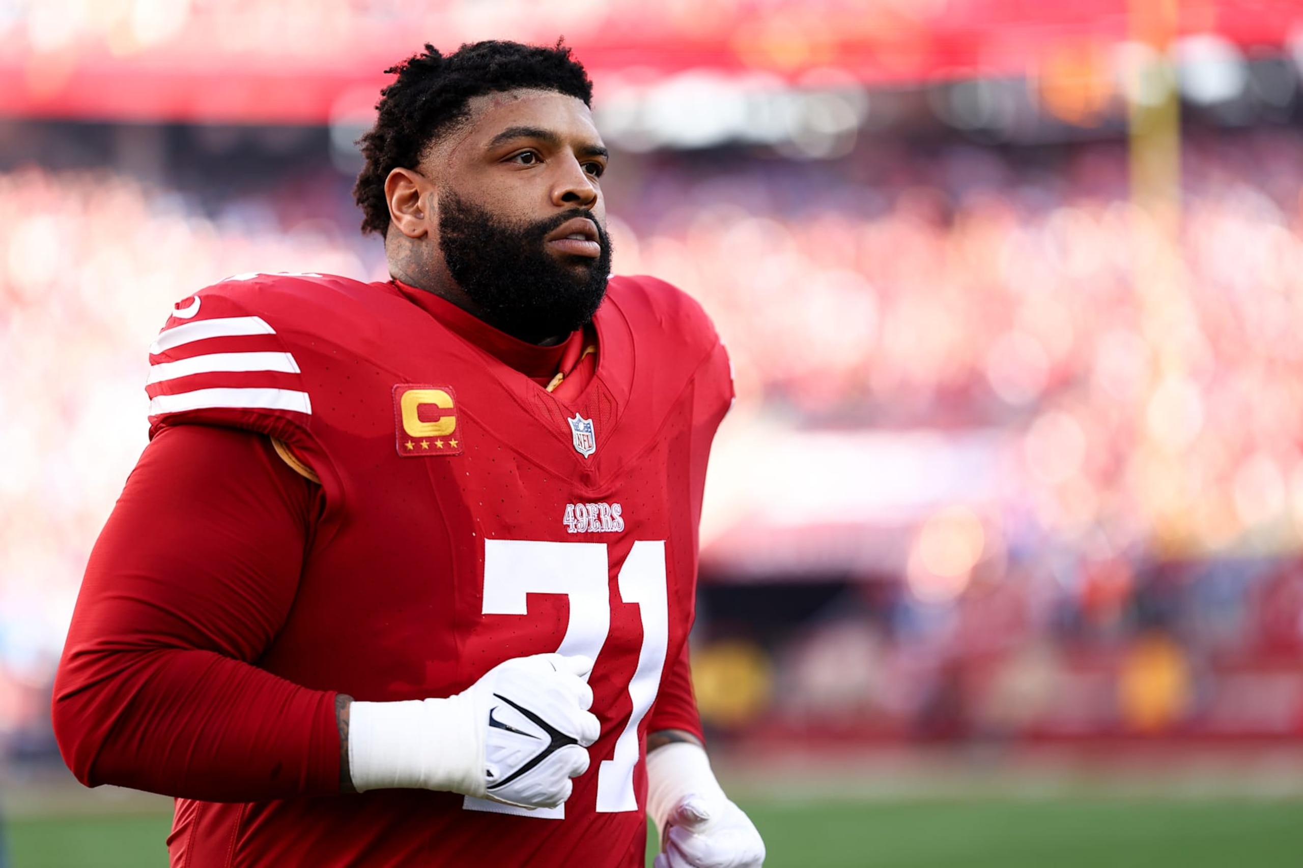SANTA CLARA, CA - JANUARY 28: Trent Williams #71 of the San Francisco 49ers jogs to the bench prior to the NFC Championship NFL football game against the Detroit Lions at Levi's Stadium on January 28, 2024 in Santa Clara, California. (Photo by Kevin Sabitus/Getty Images)