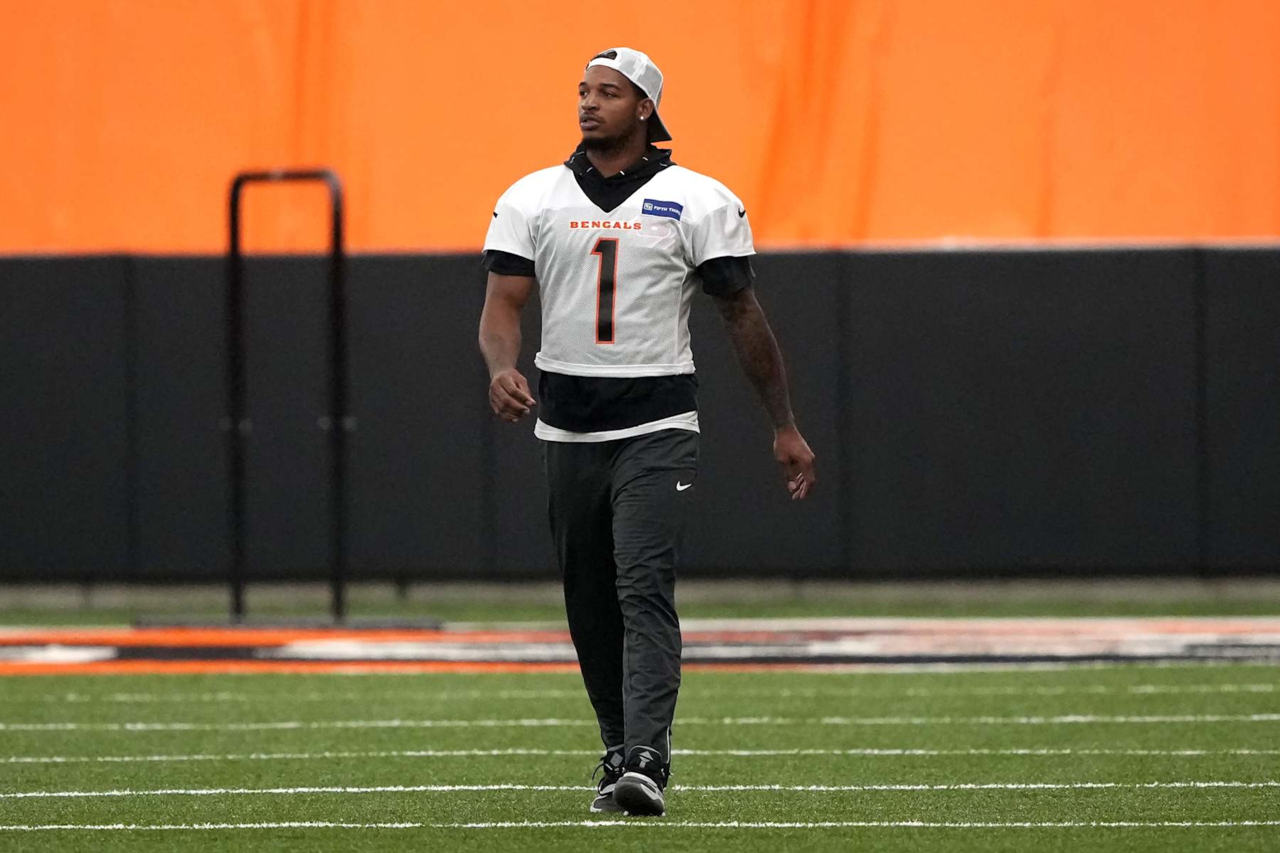 CINCINNATI, OHIO - JUNE 12: Ja'Marr Chase #1 of the Cincinnati Bengals walks across the field during mandatory minicamp at the IEL Indoor Facility on June 12, 2024 in Cincinnati, Ohio. (Photo by Dylan Buell/Getty Images)