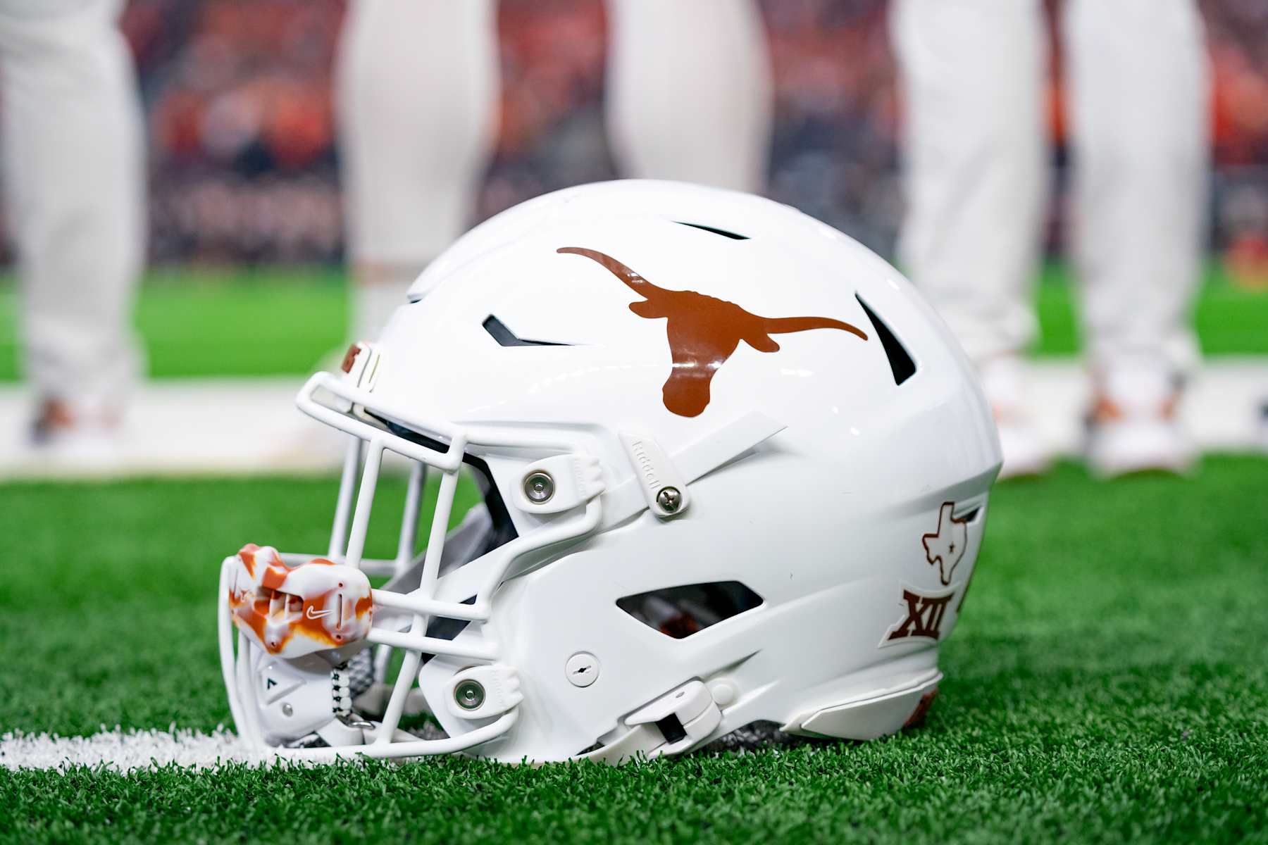 ARLINGTON, TX - DECEMBER 02: Texas Longhorns helmet sits on the sidelines during the Big 12 Championship game between the Texas Longhorns and the Oklahoma State Cowboys on December 02, 2023 at AT&T Stadium in Arlington, TX. (Photo by Chris Leduc/Icon Sportswire via Getty Images)