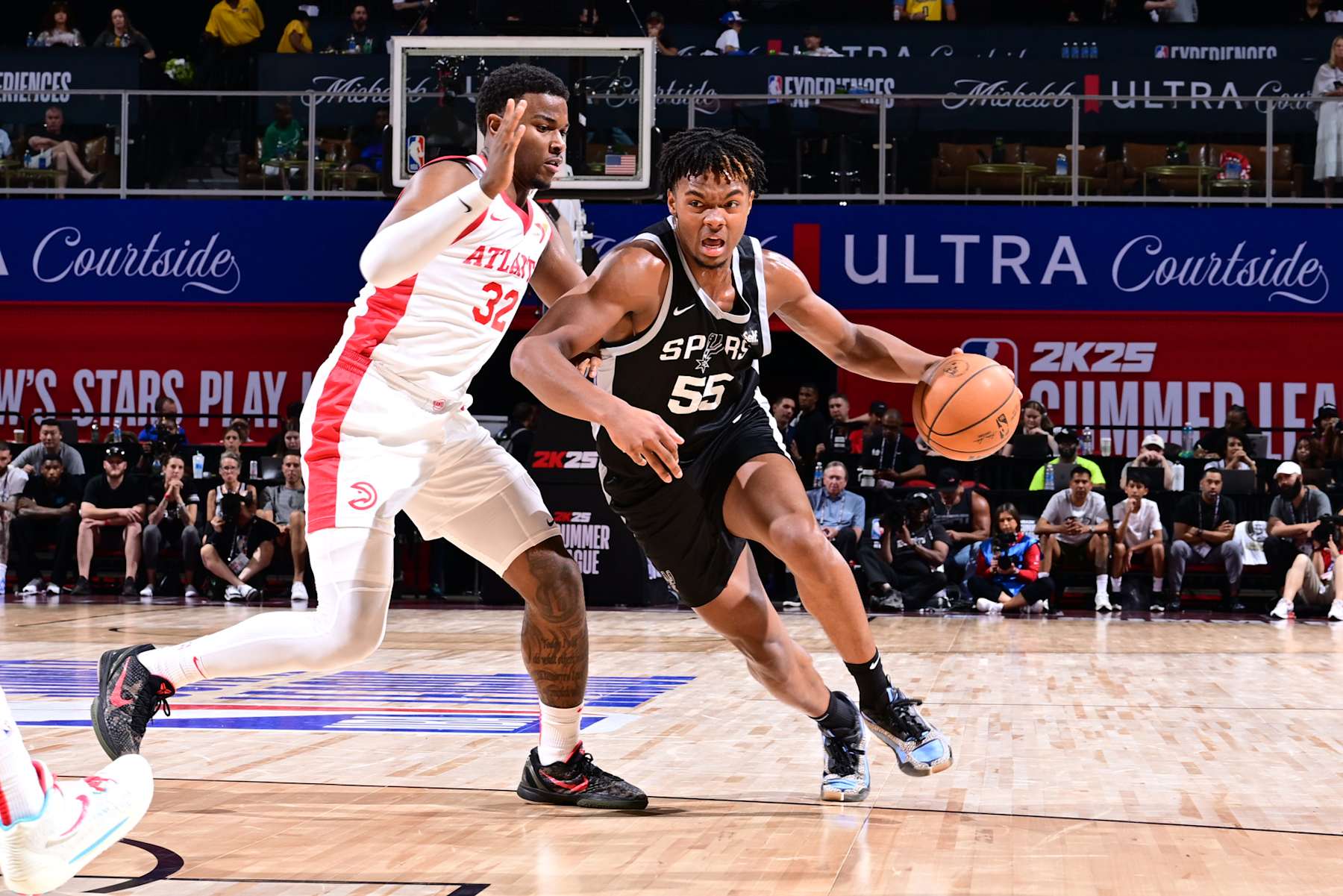LAS VEGAS, NV - JULY 14: Harrison Ingram #55 of the San Antonio Spurs drives to the basket during the game against the Atlanta Hawks on July 14, 2024 at the Thomas & Mack Center in Las Vegas, Nevada. NOTE TO USER: User expressly acknowledges and agrees that, by downloading and or using this photograph, User is consenting to the terms and conditions of the Getty Images License Agreement. Mandatory Copyright Notice: Copyright 2024 NBAE (Photo by Adam Hagy/NBAE via Getty Images)