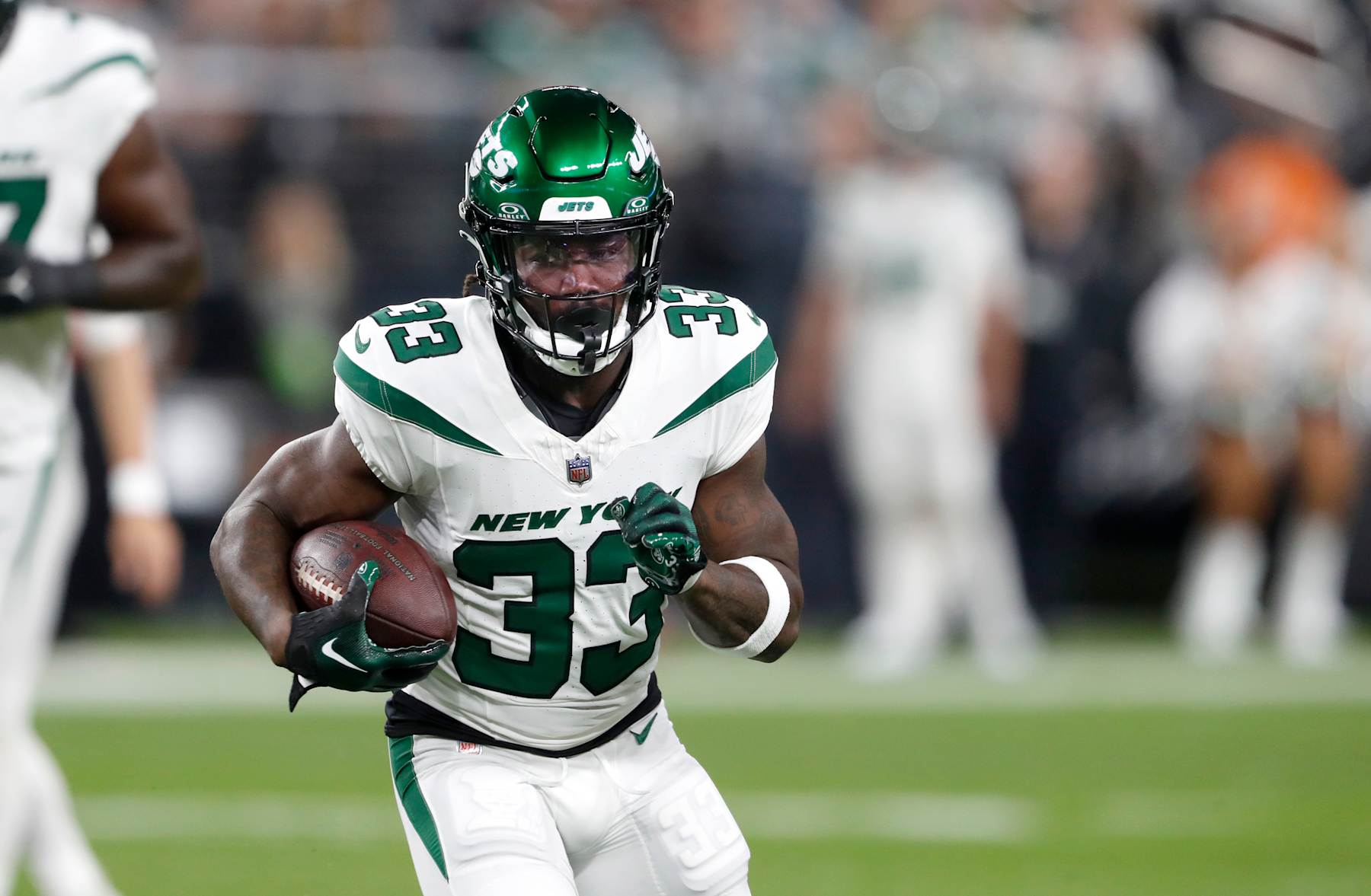 LAS VEGAS, NEVADA - NOVEMBER 12: Running back Dalvin Cook #33 of the New York Jets carries the ball against the Las Vegas Raiders during a game at Allegiant Stadium on November 12, 2023 in Las Vegas, Nevada. The Raiders defeated the Jets 16-12.  (Photo by Steve Marcus/Getty Images)