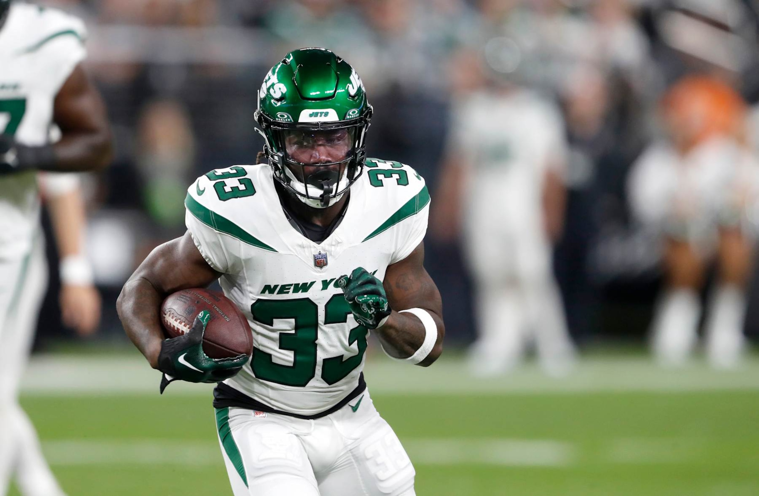 LAS VEGAS, NEVADA - NOVEMBER 12: Running back Dalvin Cook #33 of the New York Jets carries the ball against the Las Vegas Raiders during a game at Allegiant Stadium on November 12, 2023 in Las Vegas, Nevada. The Raiders defeated the Jets 16-12.  (Photo by Steve Marcus/Getty Images)