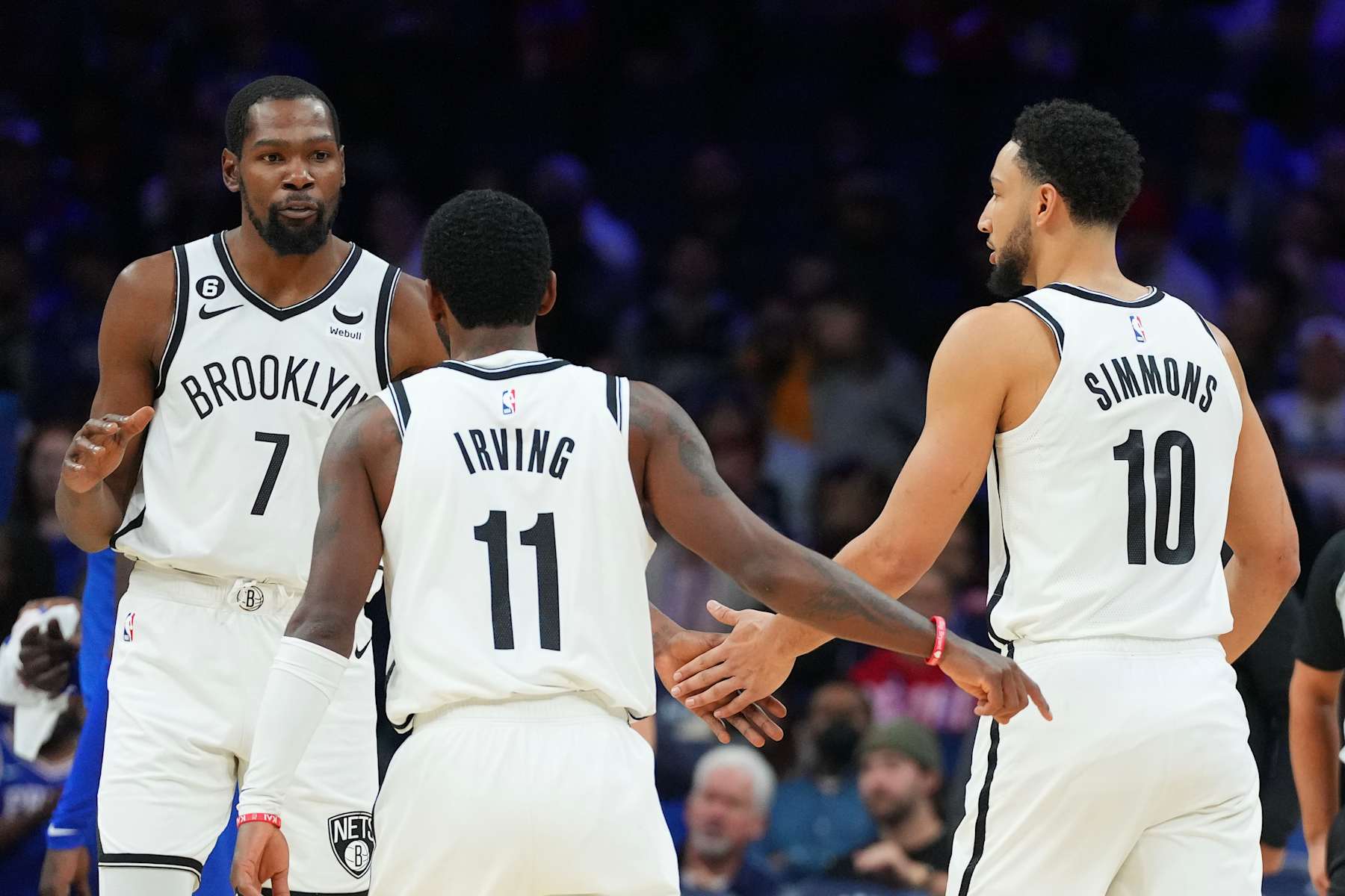 PHILADELPHIA, PA - NOVEMBER 22: Kevin Durant #7, Kyrie Irving #11, and Ben Simmons #10 of the Brooklyn Nets react against the Philadelphia 76ers at the Wells Fargo Center on November 22, 2022 in Philadelphia, Pennsylvania. NOTE TO USER: User expressly acknowledges and agrees that, by downloading and or using this photograph, User is consenting to the terms and conditions of the Getty Images License Agreement. (Photo by Mitchell Leff/Getty Images)