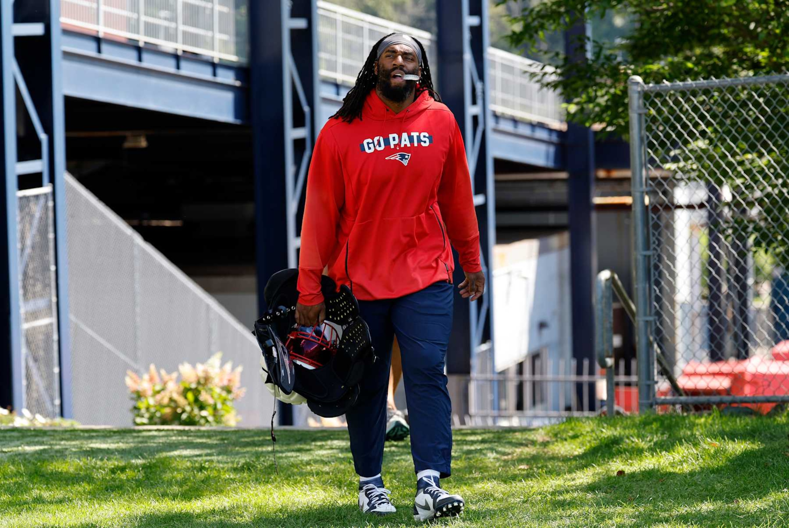 FOXBOROUGH, MA - AUGUST 13: New England Patriots outside linebacker Matthew Judon (9) arrives during joint training camp between the New England Patriots and the Philadelphia Eagles on August 13, 2024, at Gillette Stadium in Foxborough, Massachusetts. (Photo by Fred Kfoury III/Icon Sportswire via Getty Images)