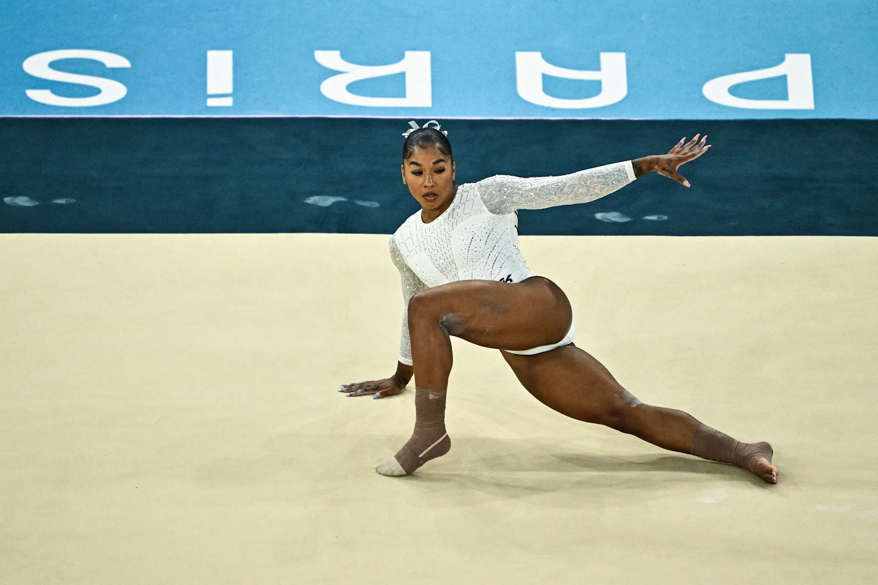 US' Jordan Chiles competes in the artistic gymnastics women's floor exercise final during the Paris 2024 Olympic Games at the Bercy Arena in Paris, on August 5, 2024. (Photo by Lionel BONAVENTURE / AFP) (Photo by LIONEL BONAVENTURE/AFP via Getty Images)