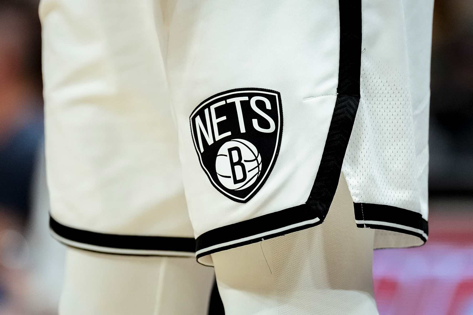 DETROIT, MICHIGAN - DECEMBER 26: The Brooklyn Nets logo on a uniform against the Detroit Pistons at Little Caesars Arena on December 26, 2023 in Detroit, Michigan. NOTE TO USER: User expressly acknowledges and agrees that, by downloading and or using this photograph, User is consenting to the terms and conditions of the Getty Images License Agreement. (Photo by Nic Antaya/Getty Images)