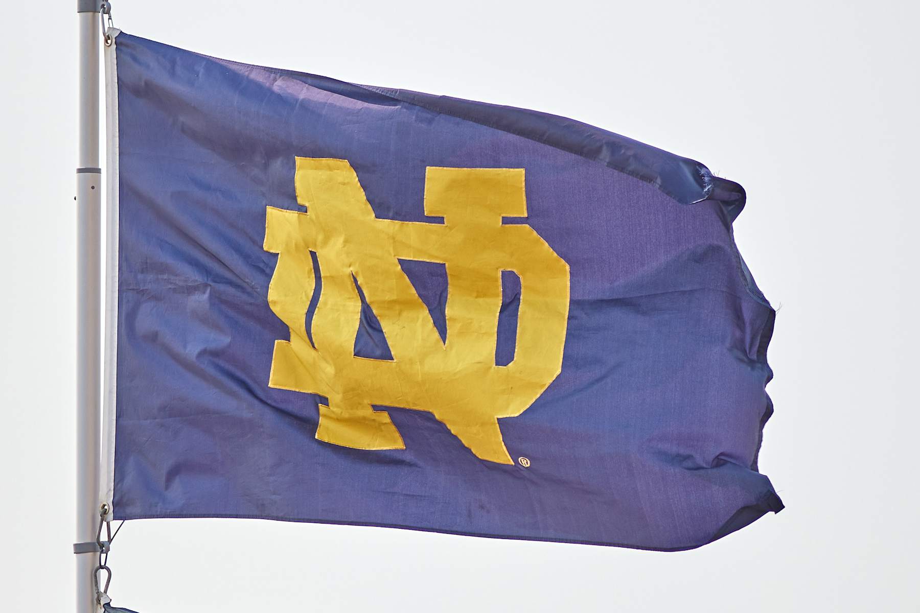 SOUTH BEND, IN - SEPTEMBER 11: A detail view of a Notre Dame Fighting Irish logo is seen on a flag during a game between the Notre Dame Fighting Irish and the Toledo Rockets on September 11, 2021 at Notre Dame Stadium, in South Bend, IN. (Photo by Robin Alam/Icon Sportswire via Getty Images)