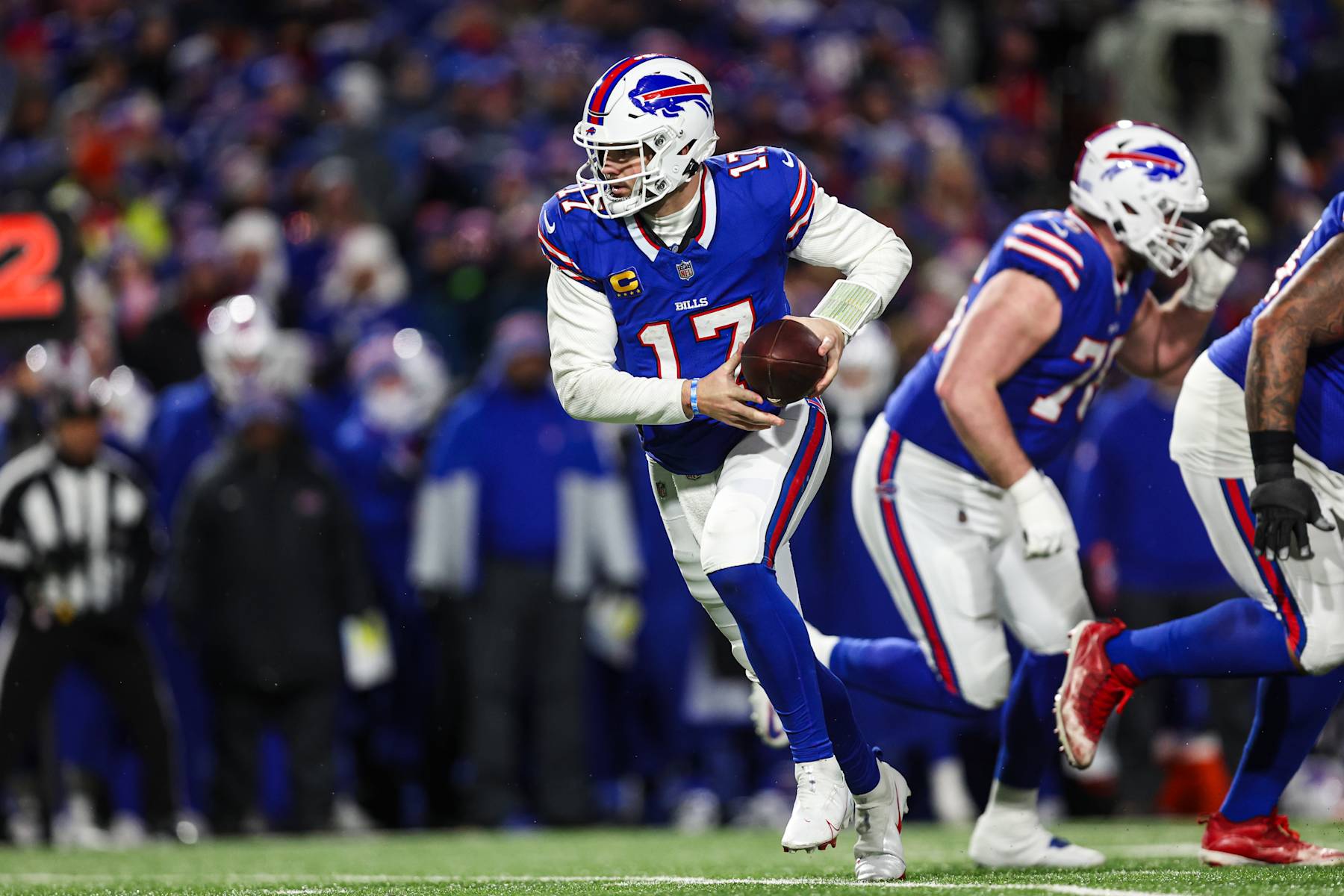 ORCHARD PARK, NY - JANUARY 21: Josh Allen #17 of the Buffalo Bills drops back with the ball during an NFL divisional round playoff football game against the Kansas City Chiefs at Highmark Stadium on January 21, 2024 in Orchard Park, New York. (Photo by Perry Knotts/Getty Images)