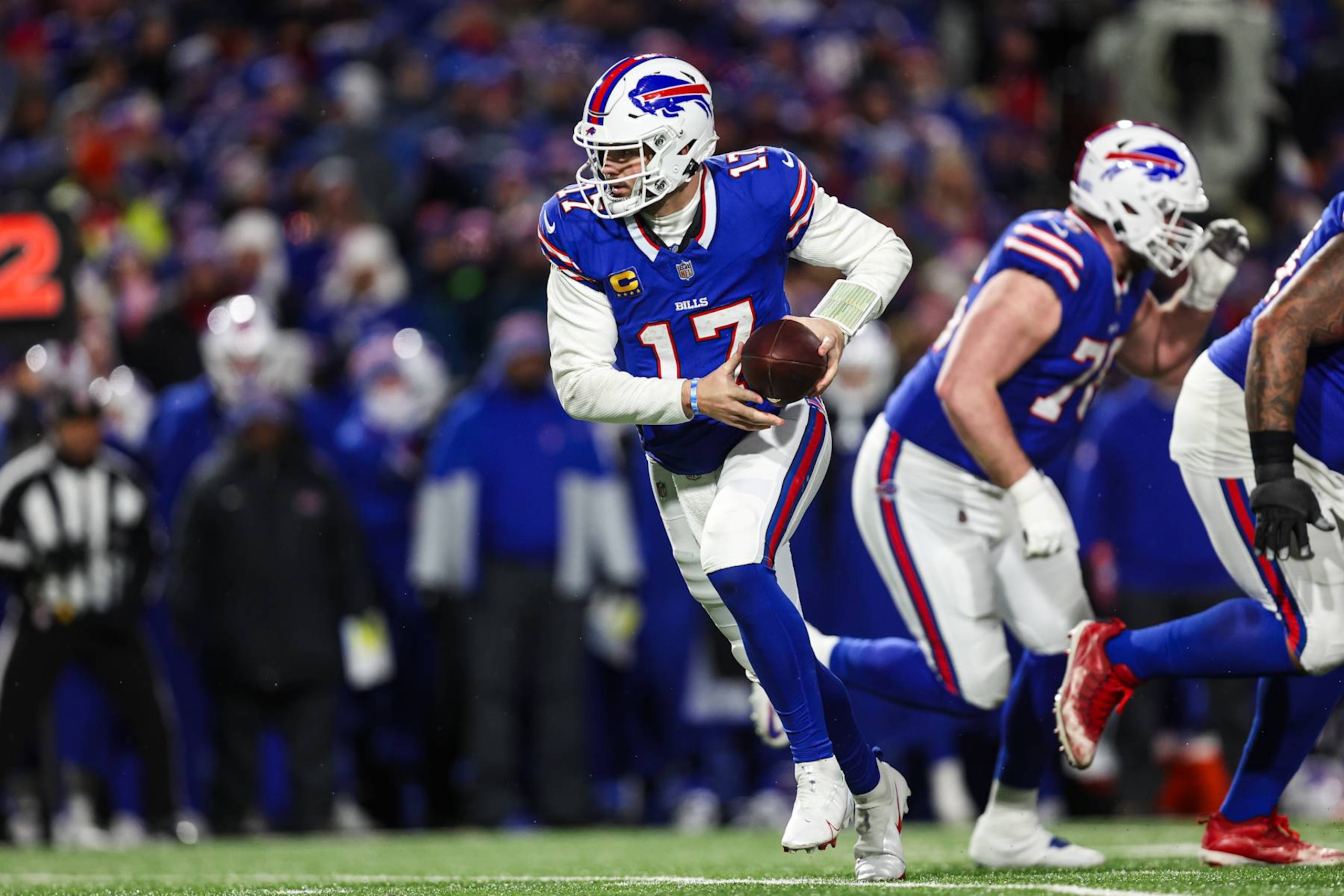 ORCHARD PARK, NY - JANUARY 21: Josh Allen #17 of the Buffalo Bills drops back with the ball during an NFL divisional round playoff football game against the Kansas City Chiefs at Highmark Stadium on January 21, 2024 in Orchard Park, New York. (Photo by Perry Knotts/Getty Images)