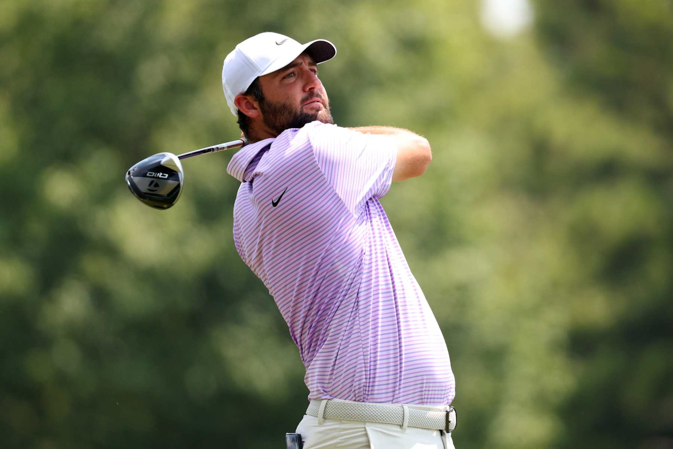 MEMPHIS, TENNESSEE - AUGUST 15: Scottie Scheffler of the United States plays his shot from the third tee during the first round of the FedEx St. Jude Championship at TPC Southwind on August 15, 2024 in Memphis, Tennessee. (Photo by Mike Mulholland/Getty Images)