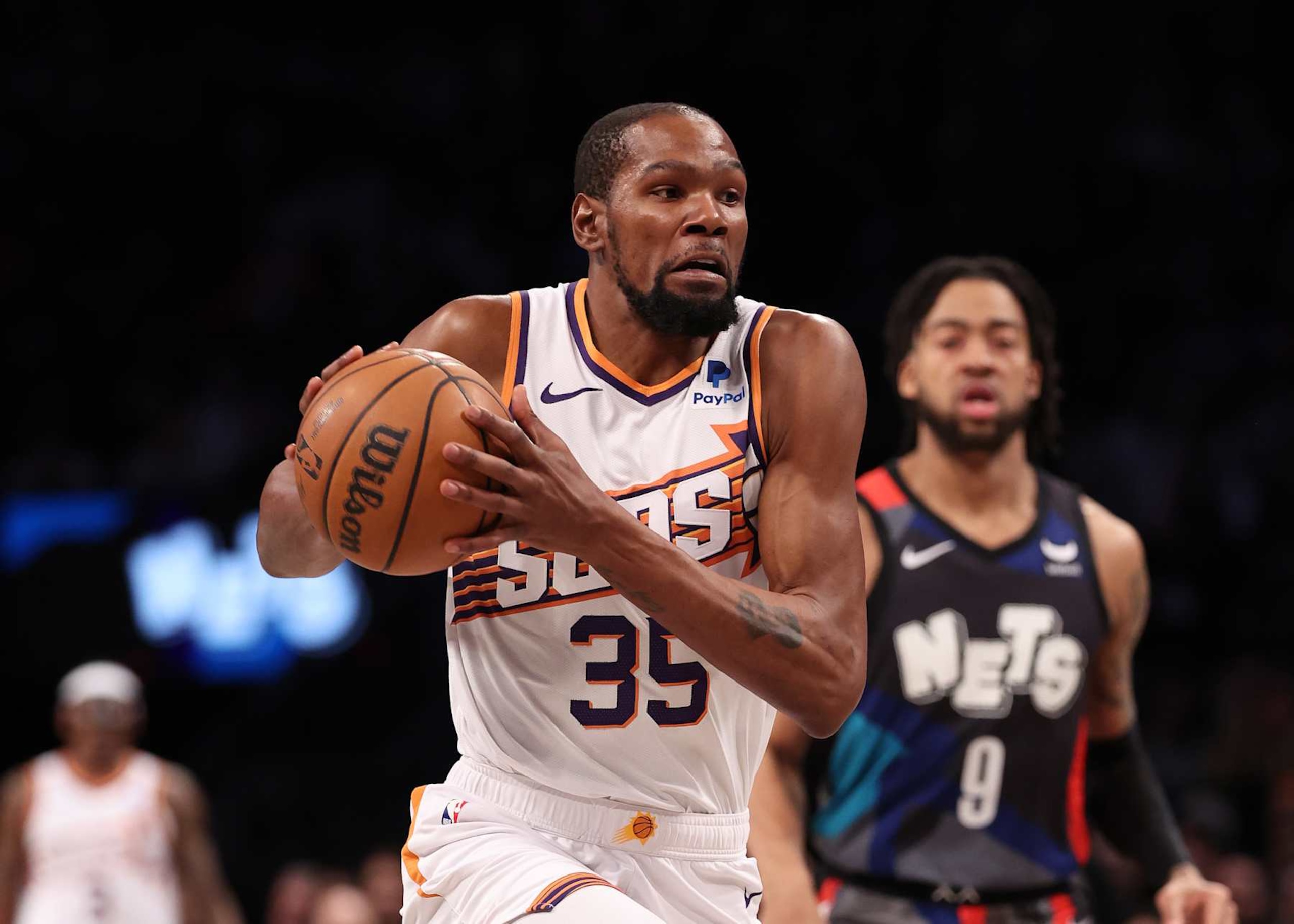 NEW YORK, NEW YORK - JANUARY 31:  Kevin Durant #35 of the Phoenix Suns in action against the Brooklyn Nets during their game at Barclays Center on January 31, 2024 in New York City.  User expressly acknowledges and agrees that, by downloading and or using this photograph, User is consenting to the terms and conditions of the Getty Images License Agreement.  (Photo by Al Bello/Getty Images)