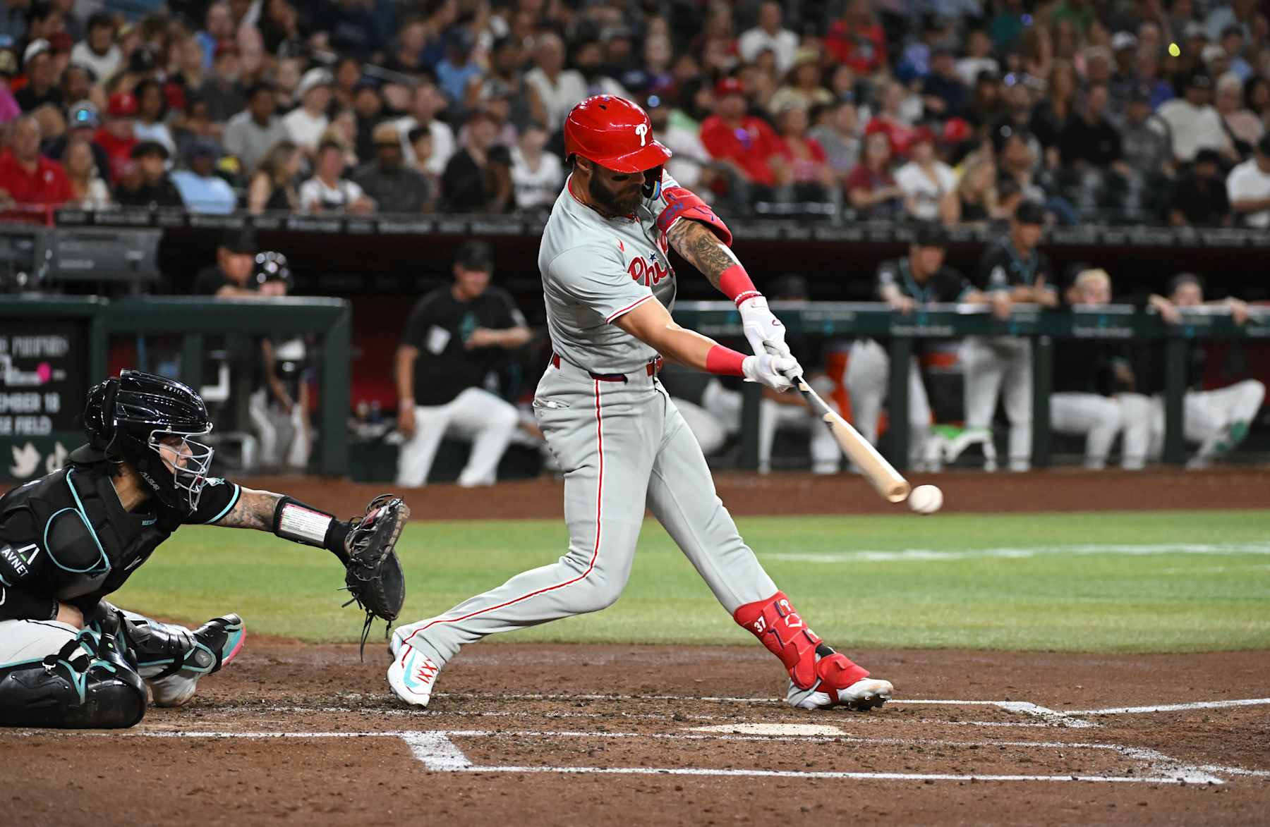 PHOENIX, ARIZONA - AUGUST 08: Weston Wilson #37 of the Philadelphia Phillies hits the ball against the Arizona Diamondbacks at Chase Field on August 08, 2024 in Phoenix, Arizona. (Photo by Norm Hall/Getty Images)