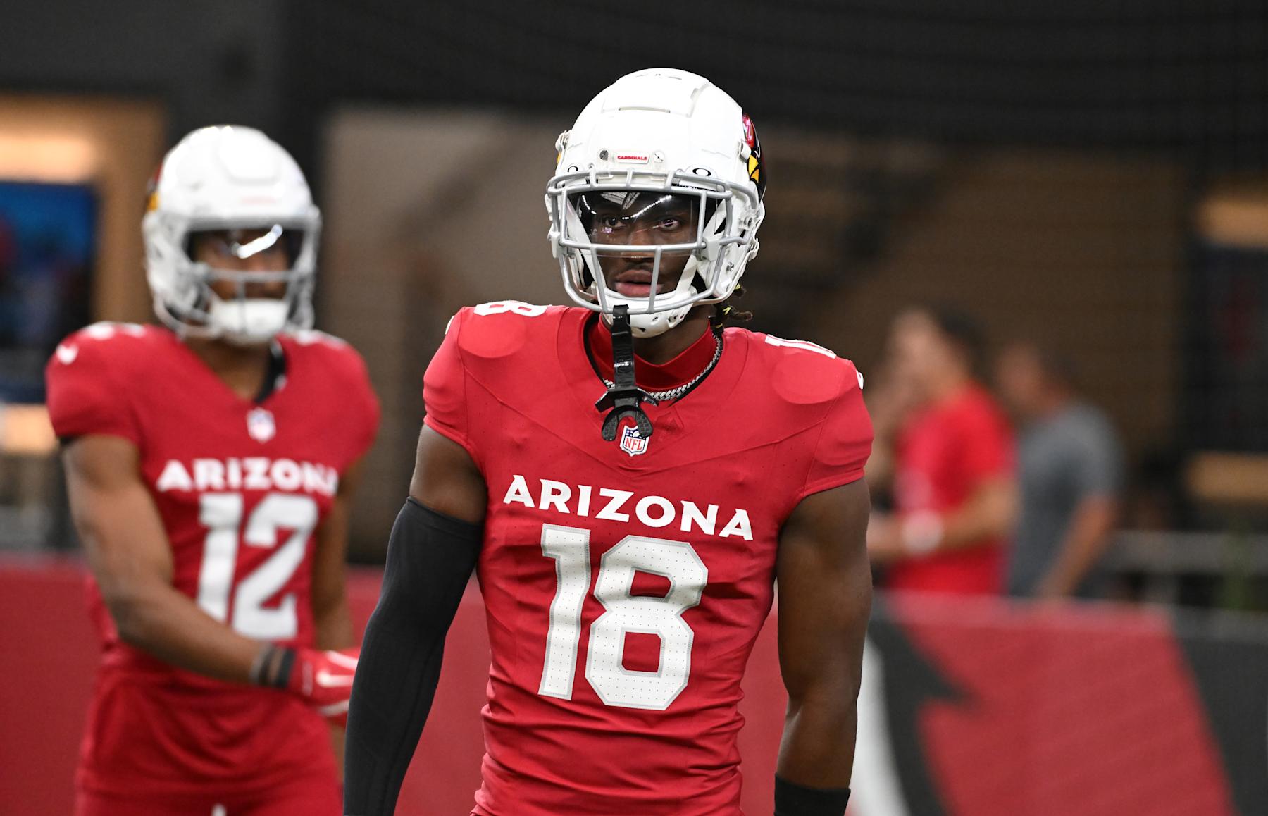 GLENDALE, ARIZONA - AUGUST 10: Marvin Harrison Jr #18 of the Arizona Cardinals prepares for a game against the New Orleans Saints at State Farm Stadium on August 10, 2024 in Glendale, Arizona. (Photo by Norm Hall/Getty Images)