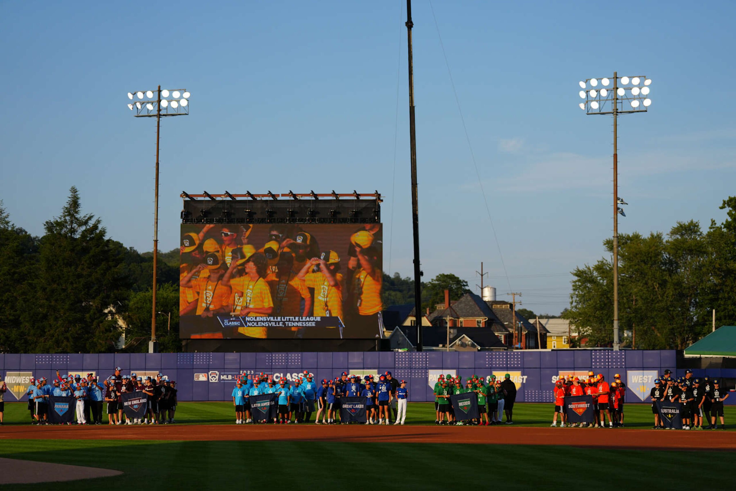 SOUTH WILLIAMSPORT, PA  - AUGUST 20:   Little League World Series teams line up on the field prior to the game between the Philadelphia Phillies and the Washington Nationals at Muncy Bank Ballpark at Historic Bowman Field on Sunday, August 20, 2023 in South Williamsport, Pennsylvania. (Photo by Daniel Shirey/MLB Photos via Getty Images)