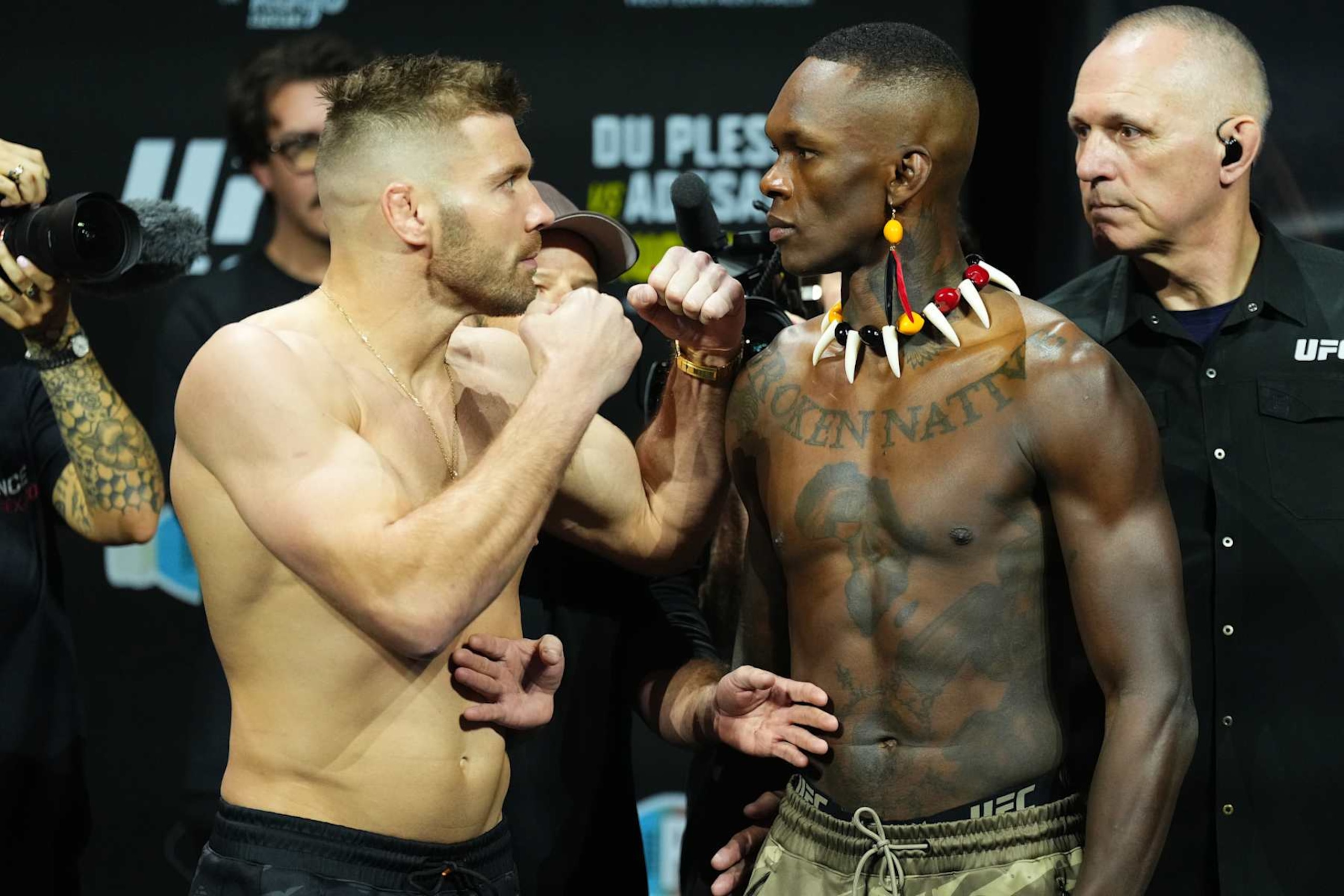 PERTH, AUSTRALIA - AUGUST 17: (L-R) Opponents Dricus Du Plessis of South Africa and Israel Adesanya of Nigeria face off during the UFC 305 ceremonial weigh-in at RAC Arena on August 17, 2024 in Perth, Australia.  (Photo by Jeff Bottari/Zuffa LLC)