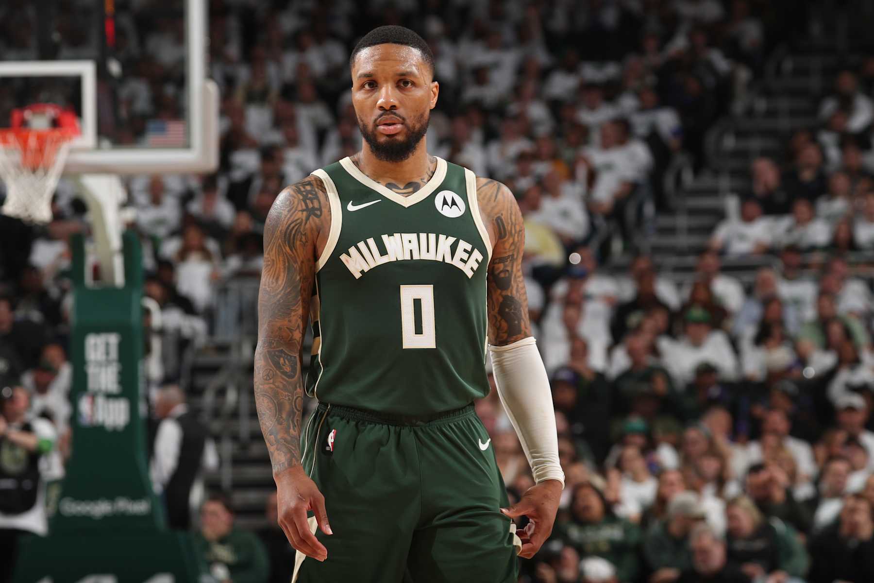MILWAUKEE, WI - APRIL 23: Damian Lillard #0 of the Milwaukee Bucks looks on during the game against the Indiana Pacers during Round One Game Two of the 2024 NBA Playoffs on April 23, 2024 at the Fiserv Forum Center in Milwaukee, Wisconsin. NOTE TO USER: User expressly acknowledges and agrees that, by downloading and or using this Photograph, user is consenting to the terms and conditions of the Getty Images License Agreement. Mandatory Copyright Notice: Copyright 2024 NBAE (Photo by Gary Dineen/NBAE via Getty Images).