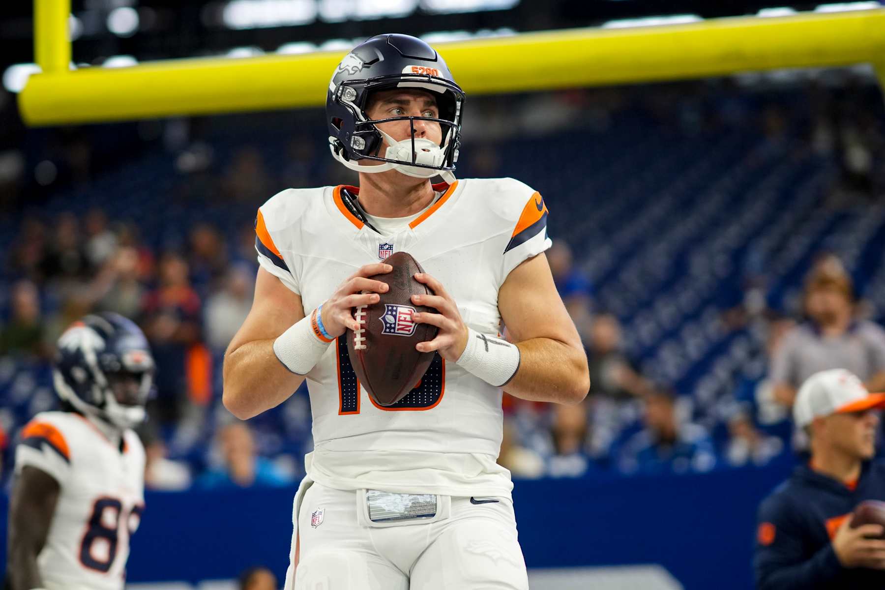 INDIANAPOLIS, IN - AUGUST 11: Bo Nix #10 of the Denver Broncos warms up prior to an NFL preseason football game against the Indianapolis Colts at Lucas Oil Stadium on August 11, 2024 in Indianapolis, Indiana. (Photo by Todd Rosenberg/Getty Images)
