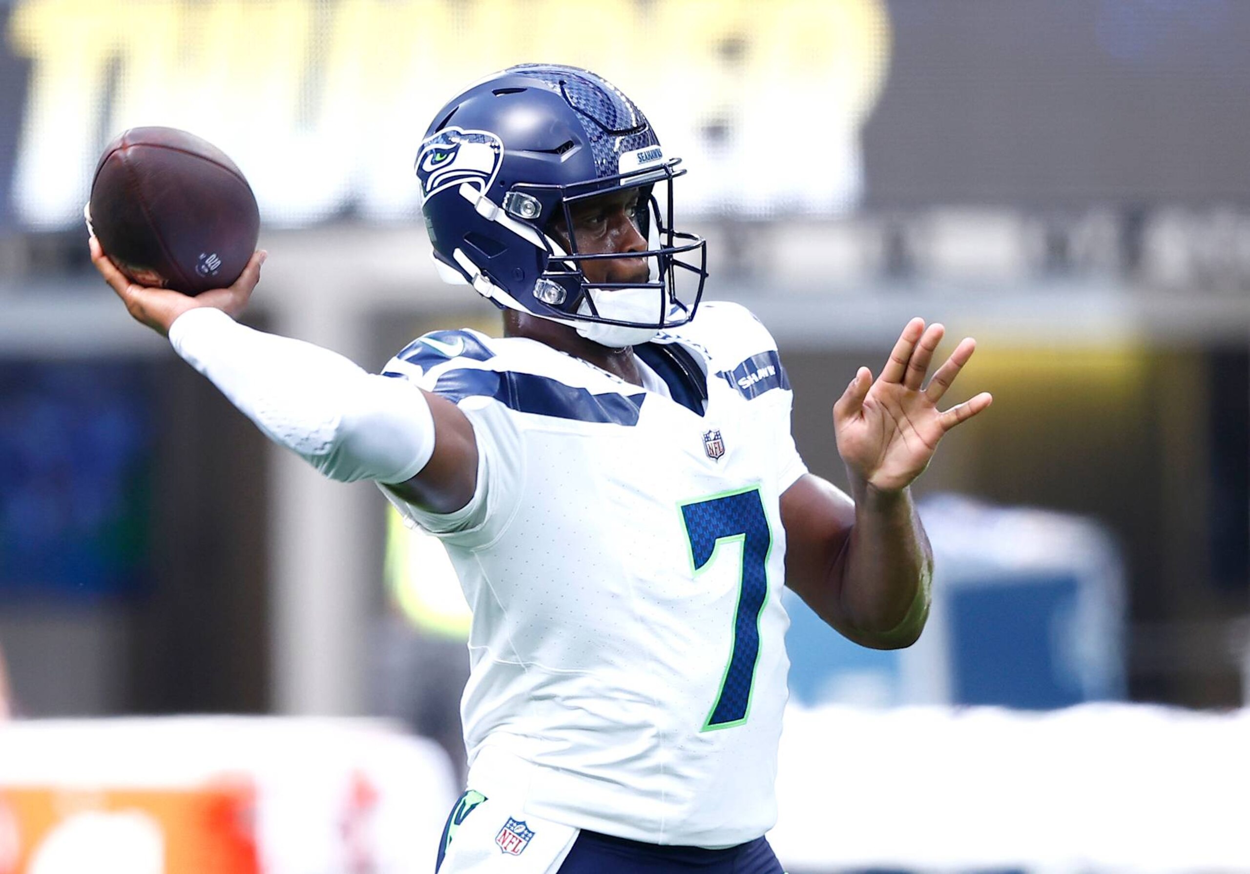INGLEWOOD, CALIFORNIA - AUGUST 10:  Geno Smith #7 of the Seattle Seahawks throws before a preseason game against the Los Angeles Chargers at SoFi Stadium on August 10, 2024 in Inglewood, California. (Photo by Ronald Martinez/Getty Images)