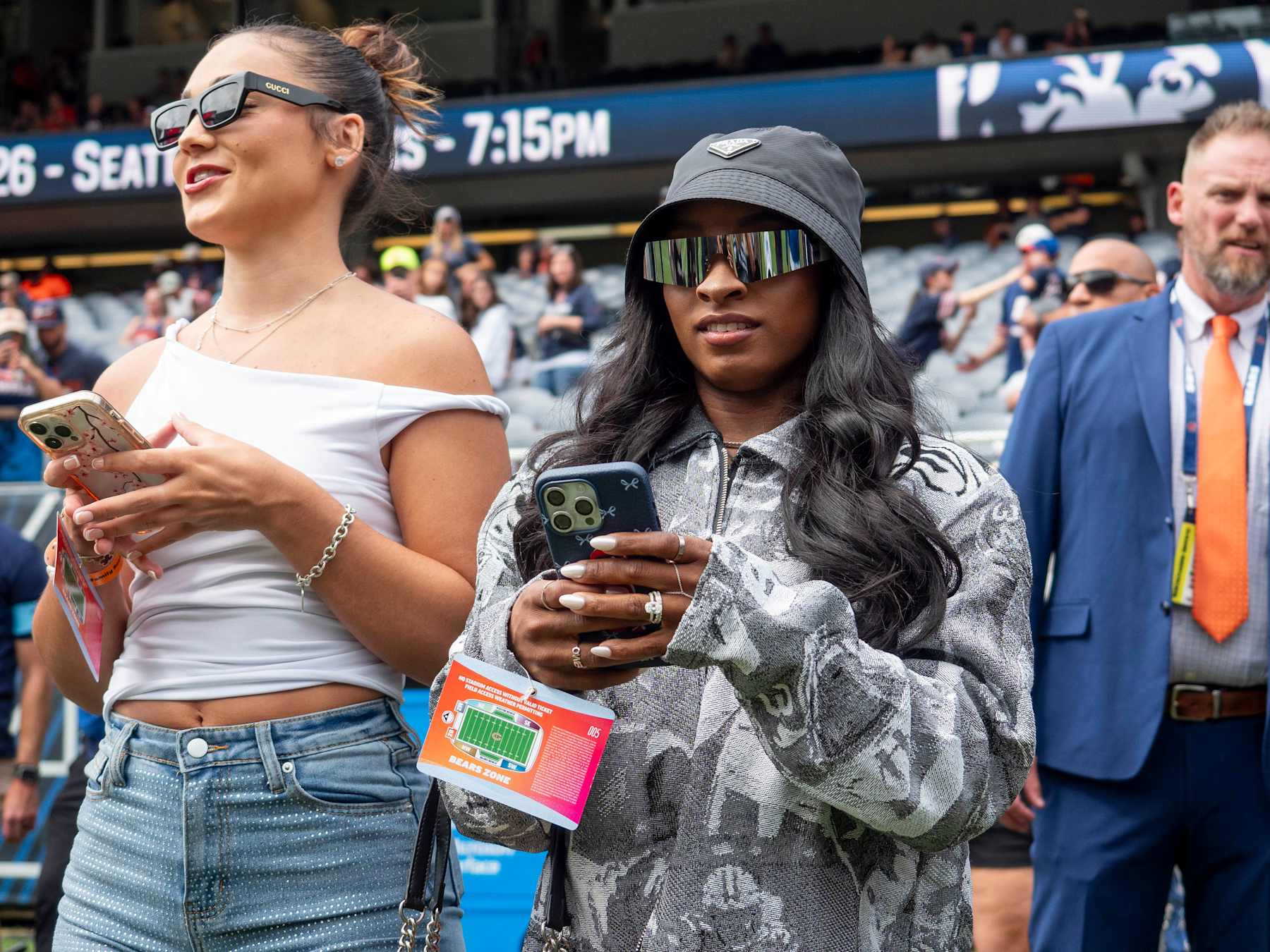 CHICAGO, IL - AUGUST 17: Team USA Olympic Gymnastics Gold Medalist Simone Biles watches the Chicago Bears warm up before a preseason game between the Cincinnati Bengals and the Chicago Bears on August 17, 2024, at Soldier Field in Chicago, Illinois. (Photo by Joseph Weiser/Icon Sportswire via Getty Images)