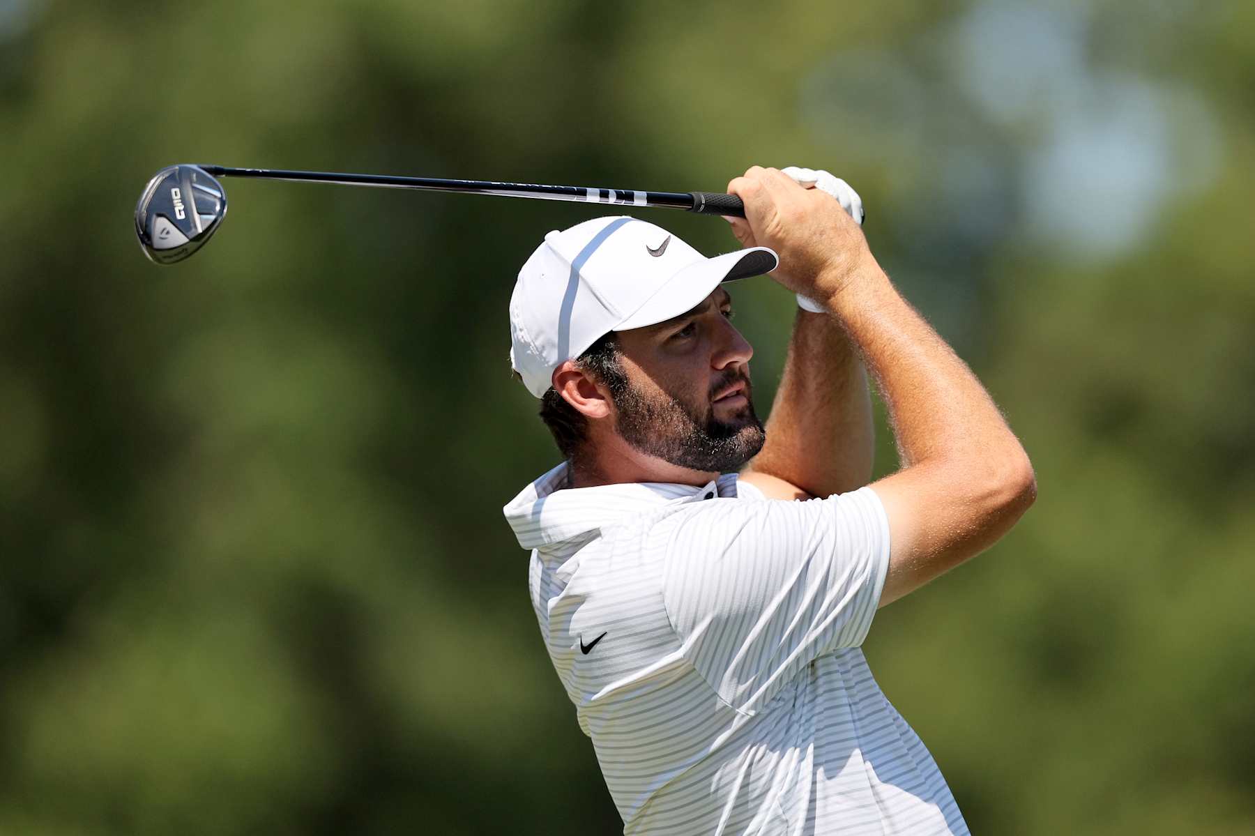 MEMPHIS, TENNESSEE - AUGUST 17: Scottie Scheffler of the United States plays his shot from the 12th teeduring the third round of the FedEx St. Jude Championship at TPC Southwind on August 17, 2024 in Memphis, Tennessee. (Photo by Andy Lyons/Getty Images)