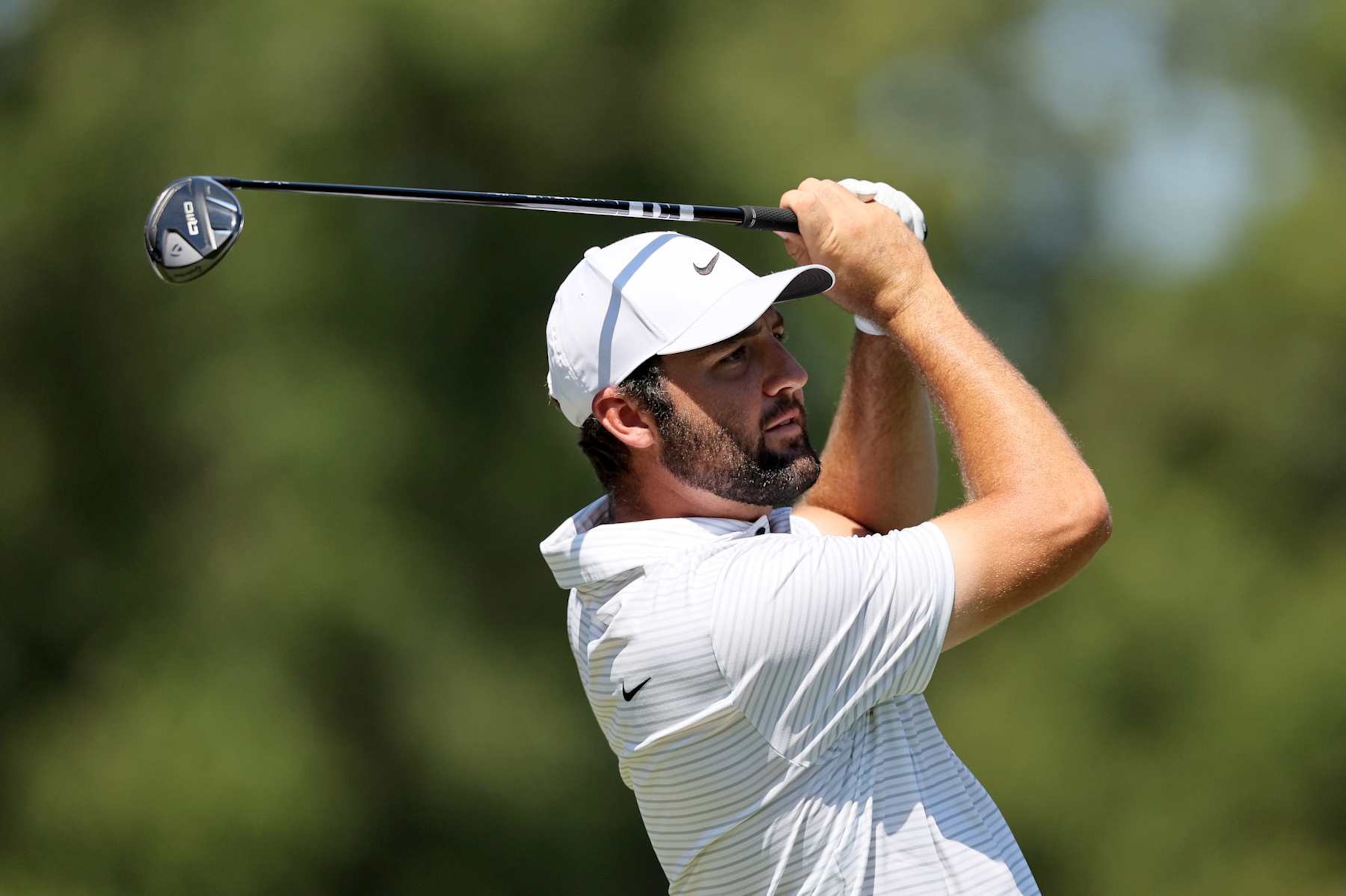 MEMPHIS, TENNESSEE - AUGUST 17: Scottie Scheffler of the United States plays his shot from the 12th teeduring the third round of the FedEx St. Jude Championship at TPC Southwind on August 17, 2024 in Memphis, Tennessee. (Photo by Andy Lyons/Getty Images)