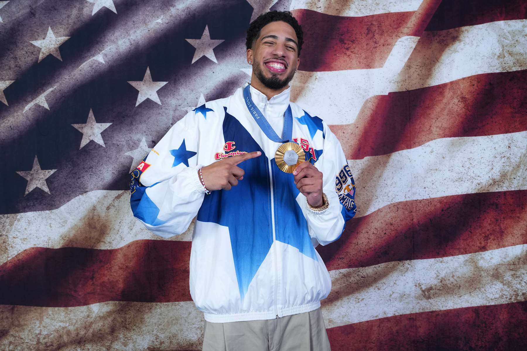 PARIS, FRANCE - AUGUST 10: Tyrese Haliburton of the USA Men's National Team poses for portraits with the Gold Medal at the hotel on August 10, 2024 in Paris, France. NOTE TO USER: User expressly acknowledges and agrees that, by downloading and/or using this photograph, user is consenting to the terms and conditions of the Getty Images License Agreement. Mandatory Copyright Notice: Copyright 2024 NBAE (Photo by Jesse D. Garrabrant/NBAE via Getty Images)