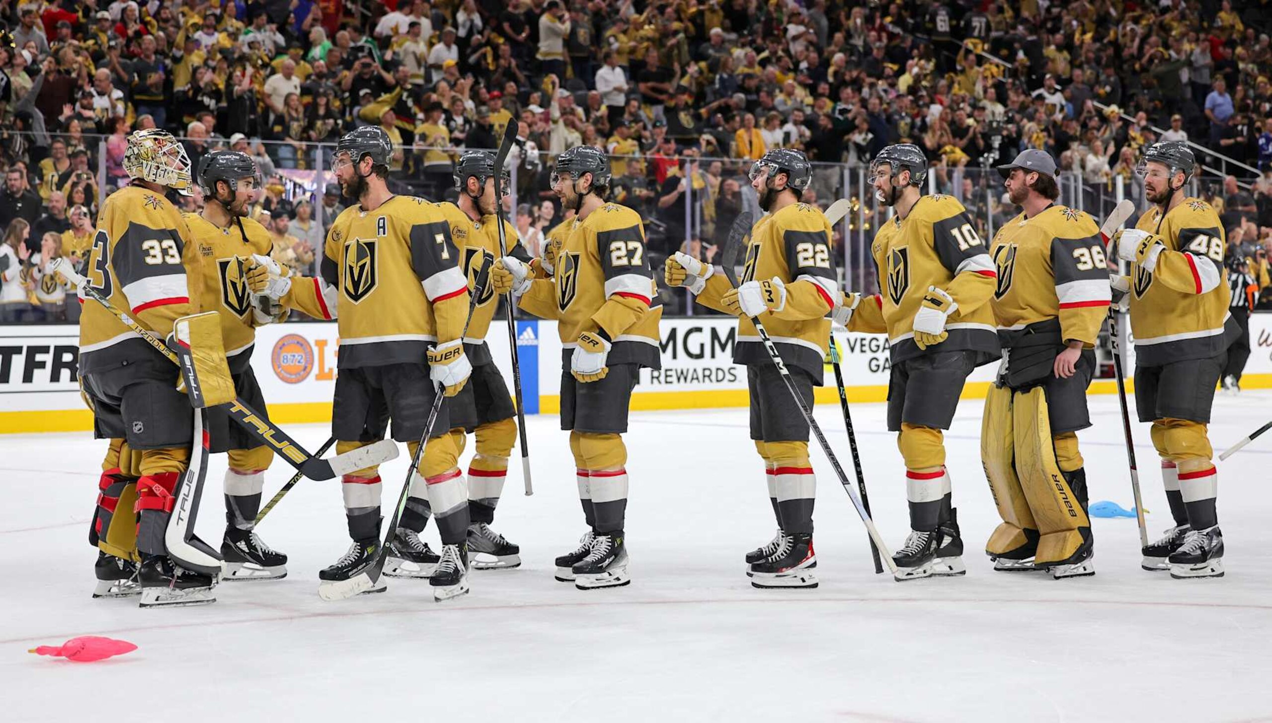 LAS VEGAS, NEVADA - MAY 03: Adin Hill #33 of the Vegas Golden Knights celebrates with teammates after their 2-0 victory over the Dallas Stars in Game Six of the First Round of the 2024 Stanley Cup Playoffs at T-Mobile Arena on May 03, 2024 in Las Vegas, Nevada. (Photo by Ethan Miller/Getty Images)
