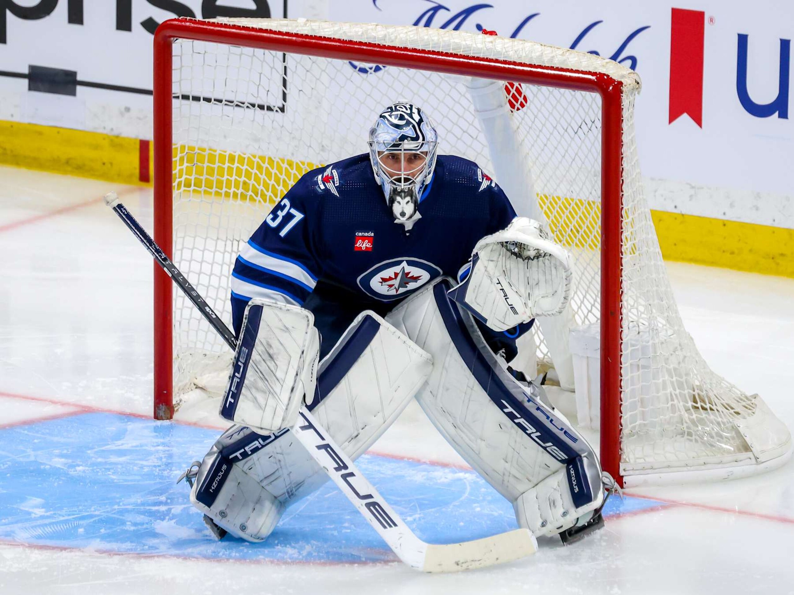 WINNIPEG, CANADA - APRIL 30: Goaltender Connor Hellebuyck #37 of the Winnipeg Jets guards the net during third period action against the Colorado Avalanche in Game Five of the First Round of the 2024 Stanley Cup Playoffs at Canada Life Centre on April 30, 2024 in Winnipeg, Manitoba, Canada. (Photo by Jonathan Kozub/NHLI via Getty Images)