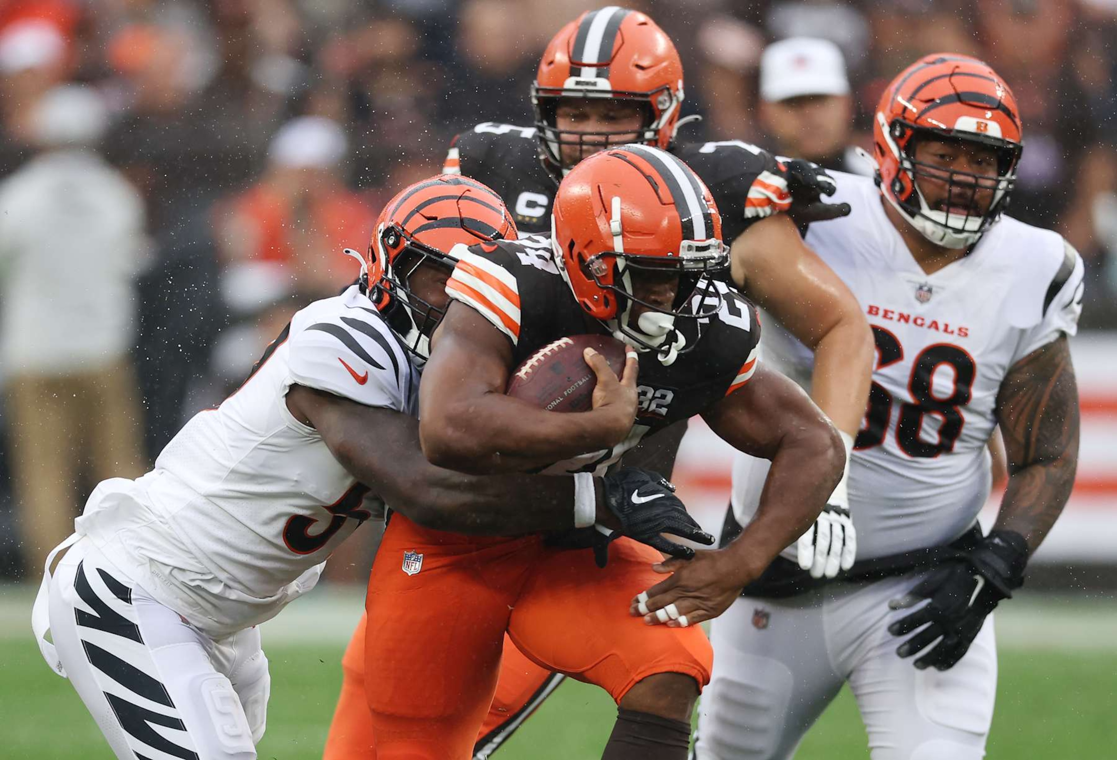 CLEVELAND, OHIO - SEPTEMBER 10:  Nick Chubb #24 of the Cleveland Browns is wrapped up by Germaine Pratt #57 of the Cincinnati Bengals after a catch \d1h at Cleveland Browns Stadium on September 10, 2023 in Cleveland, Ohio. (Photo by Gregory Shamus/Getty Images)