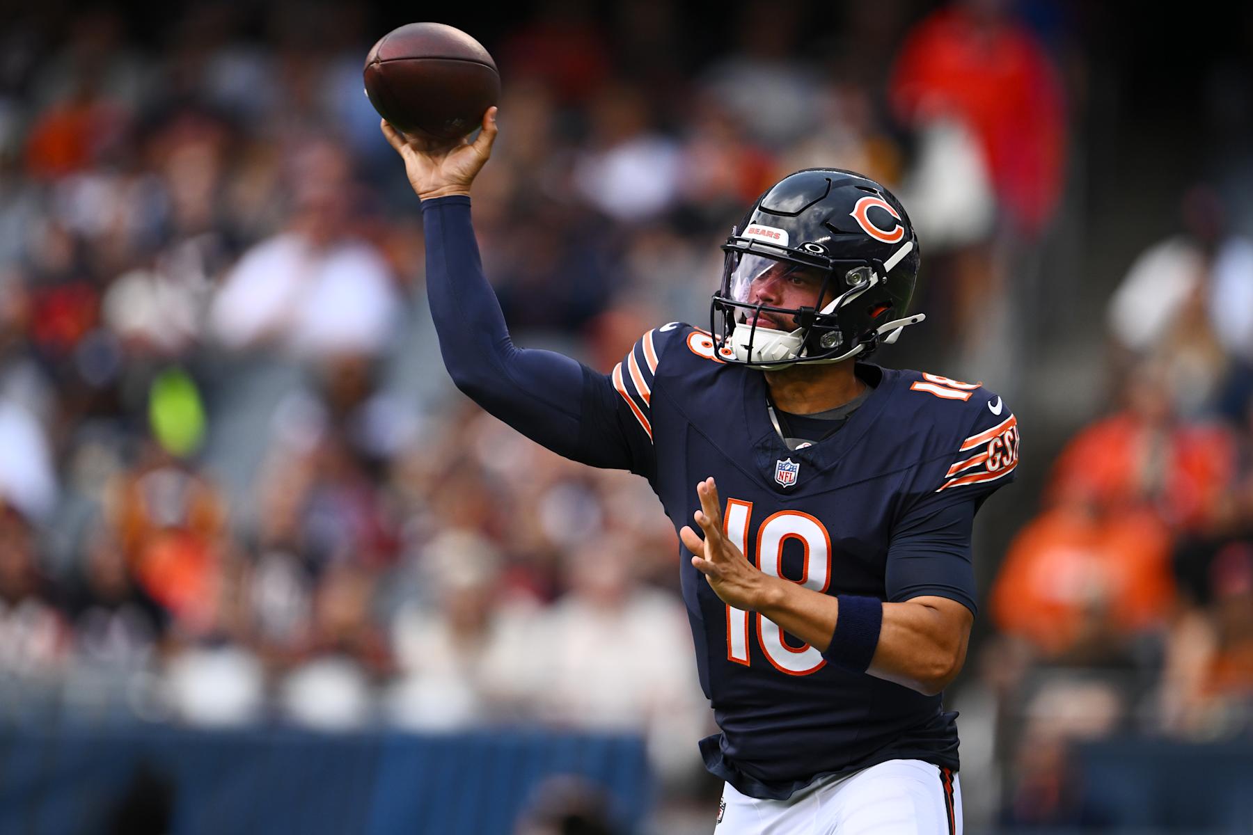 CHICAGO, ILLINOIS - AUGUST 17: Caleb Williams #18 of the Chicago Bears passes in the first half of a preseason game against the Cincinnati Bengals at Soldier Field on August 17, 2024 in Chicago, Illinois. (Photo by Quinn Harris/Getty Images)