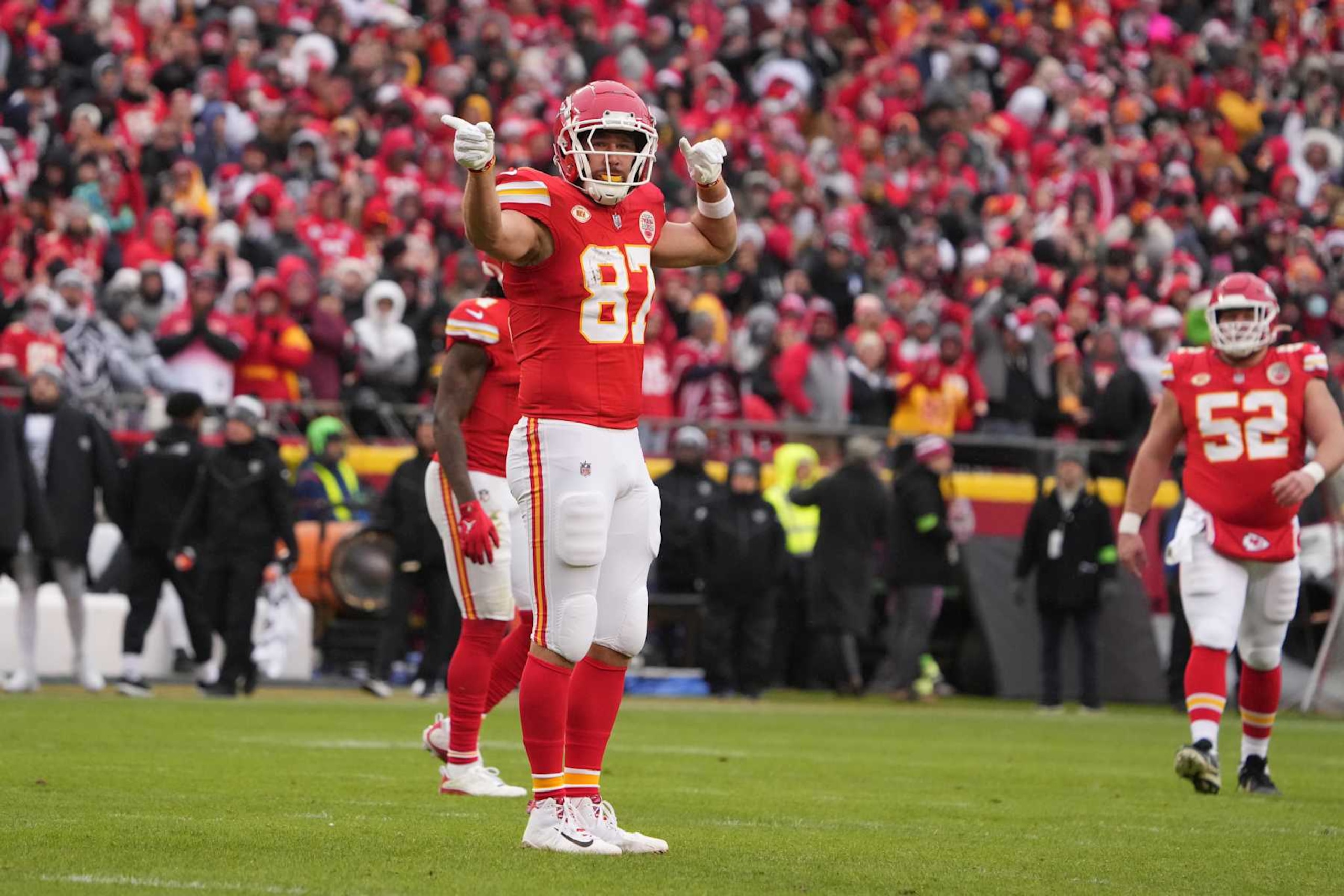KANSAS CITY, MISSOURI - DECEMBER 25: Kansas City Chiefs tight end Travis Kelce (87) gestures after a first down against the Las Vegas Raiders during an NFL football game on December 25, 2023 in Kansas City, Missouri. The Raiders defeated the Chiefs 20-14.  (Photo by Kirby Lee/Getty Images)