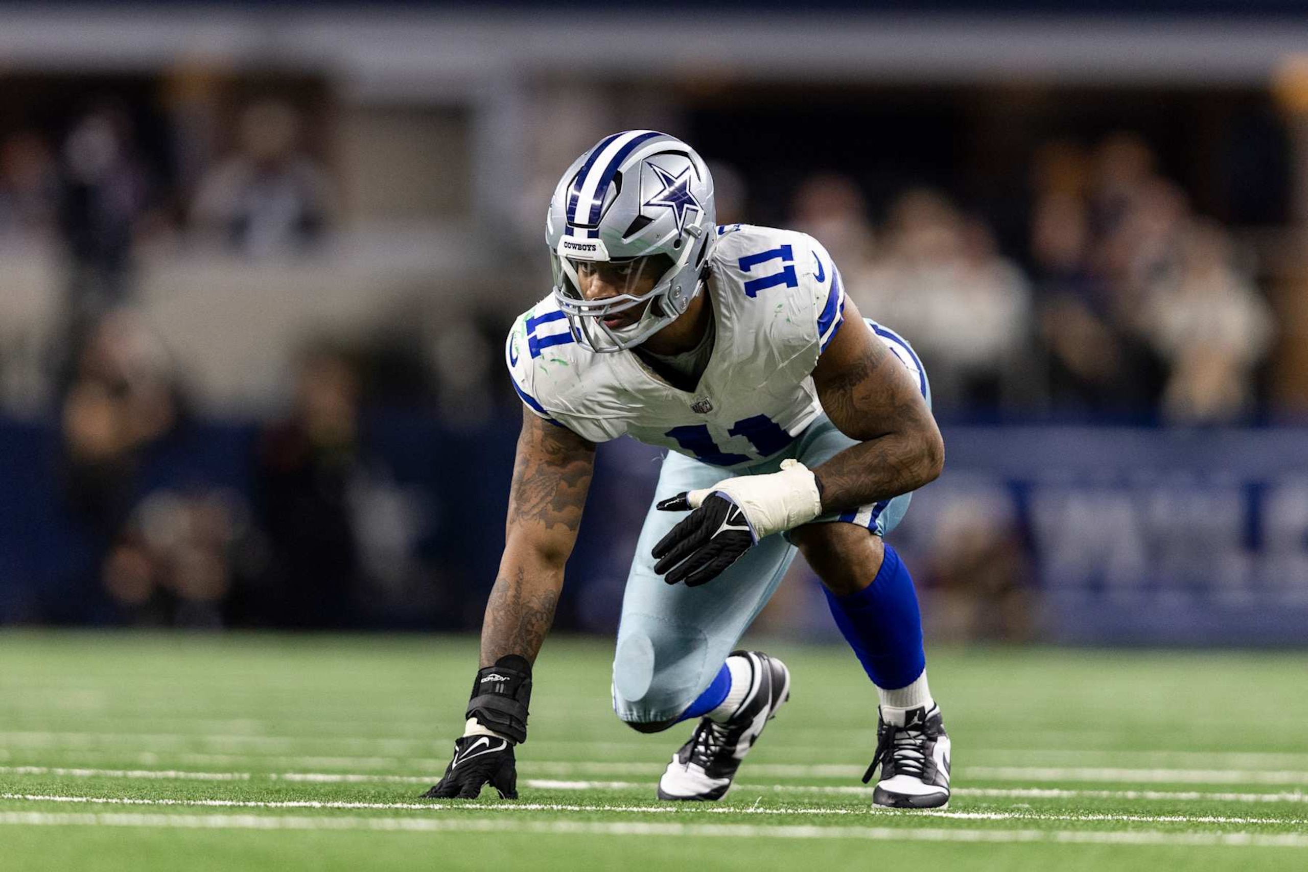 ARLINGTON, TEXAS - JANUARY 14: Micah Parsons #11 of the Dallas Cowboys lines up during an NFL wild-card playoff football game between the Dallas Cowboys and the Green Bay Packers at AT&T Stadium on January 14, 2024 in Arlington, Texas. (Photo by Michael Owens/Getty Images)