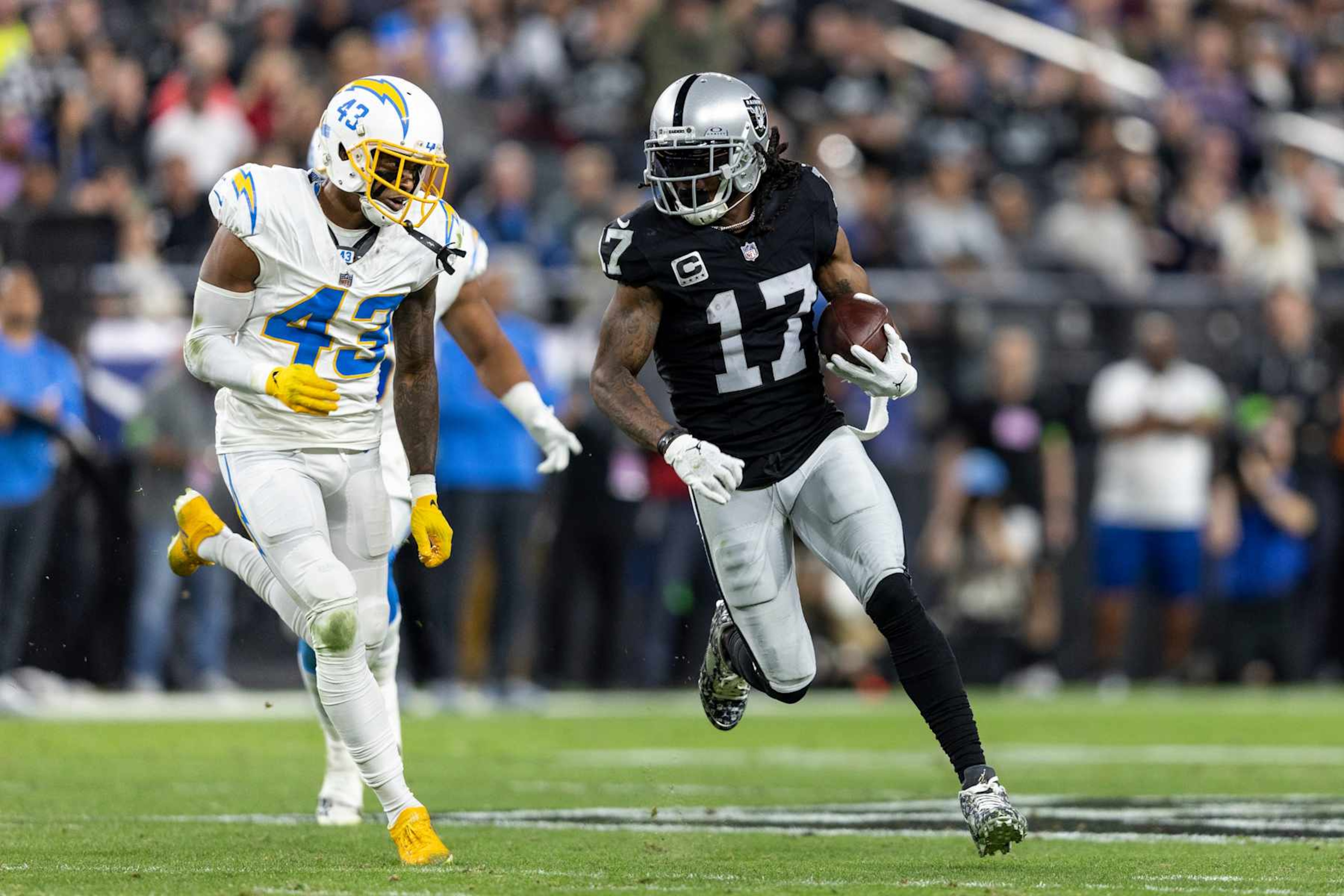 LAS VEGAS, NEVADA - DECEMBER 14: Davante Adams #17 of the Las Vegas Raiders runs with the ball during an NFL football game between the Las Vegas Raiders and the Los Angeles Chargers at Allegiant Stadium on December 14, 2023 in Las Vegas, Nevada. (Photo by Michael Owens/Getty Images) LAS VEGAS, NEVADA - DECEMBER 14: Davante Adams #17 of the Las Vegas Raiders runs with the ball during an NFL football game between the Las Vegas Raiders and the Los Angeles Chargers at Allegiant Stadium on December 14, 2023 in Las Vegas, Nevada. (Photo by Michael Owens/Getty Images)