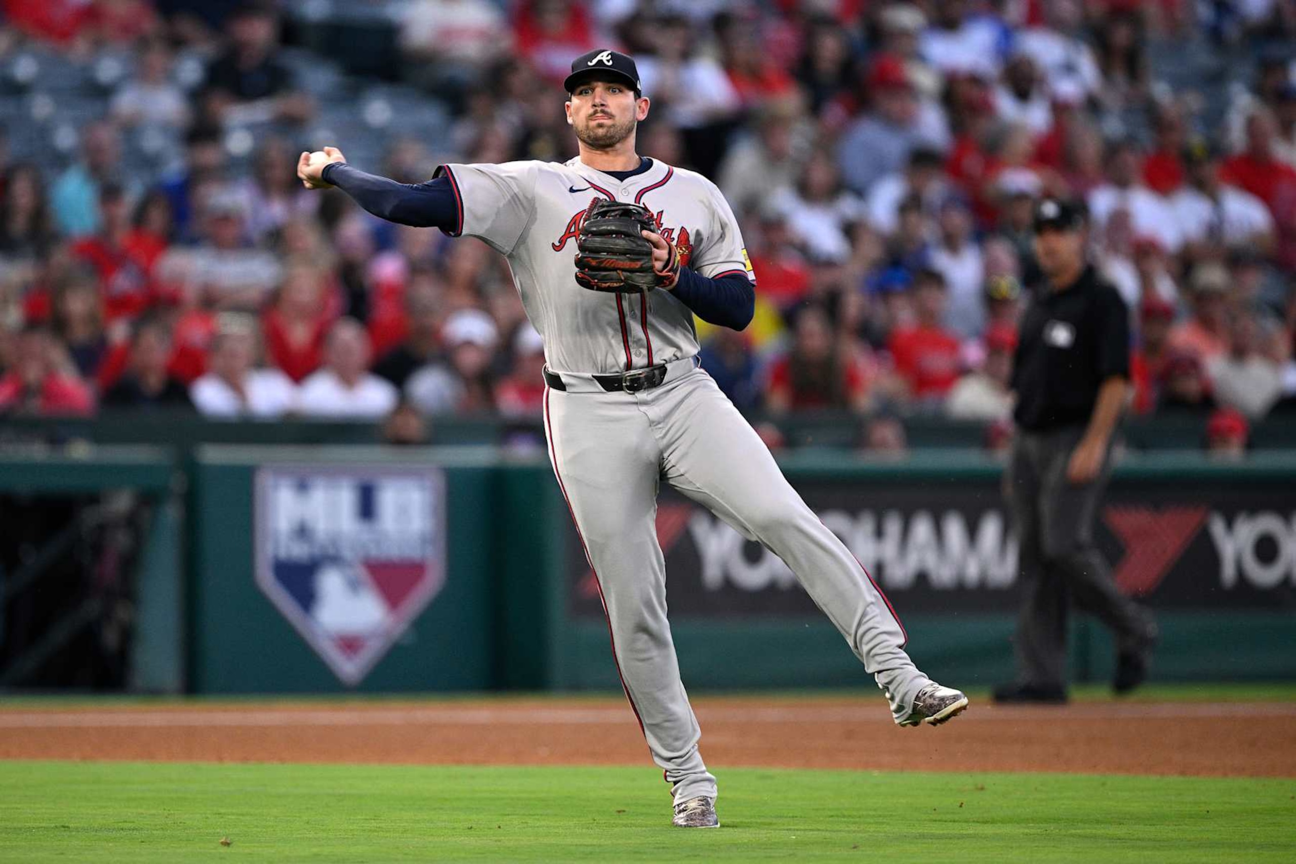 ANAHEIM, CALIFORNIA - AUGUST 16: Austin Riley #27 of the Atlanta Braves throws to first base during the third inning against the Los Angeles Angels at Angel Stadium of Anaheim on August 16, 2024 in Anaheim, California. (Photo by Orlando Ramirez/Getty Images) ANAHEIM, CALIFORNIA - AUGUST 16: Austin Riley #27 of the Atlanta Braves throws to first base during the third inning against the Los Angeles Angels at Angel Stadium of Anaheim on August 16, 2024 in Anaheim, California. (Photo by Orlando Ramirez/Getty Images)