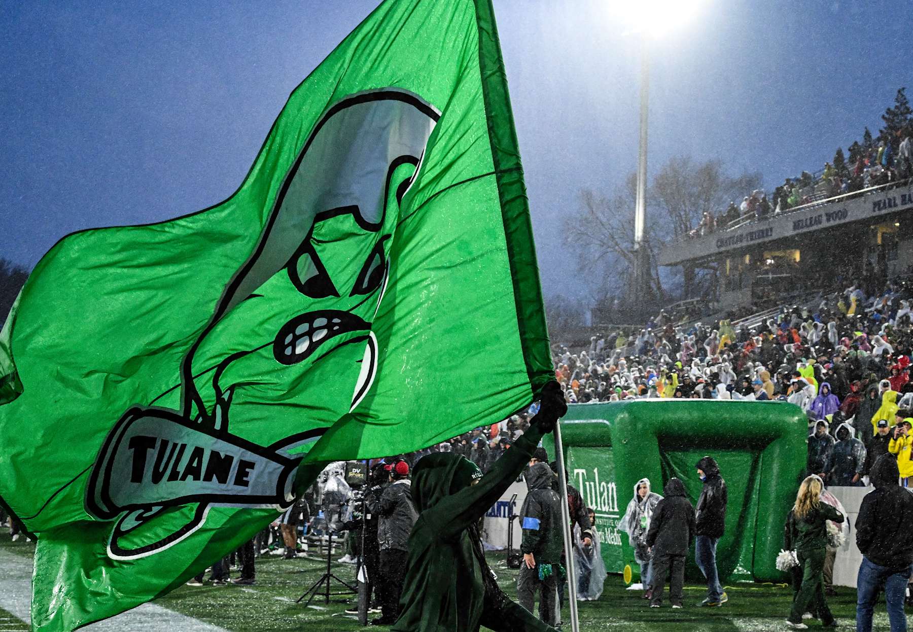 ANNAPOLIS, MD - DECEMBER 27:  A Tulane Green Wave cheerleader celebrates a touchdown during the Military Bowl between the Virginia Tech Hokies and Tulane Green Wave on December 27, 2023 at Navy-Marine Corps Memorial Stadium in Annapolis Maryland. (Photo by Mark Goldman/Icon Sportswire via Getty Images)