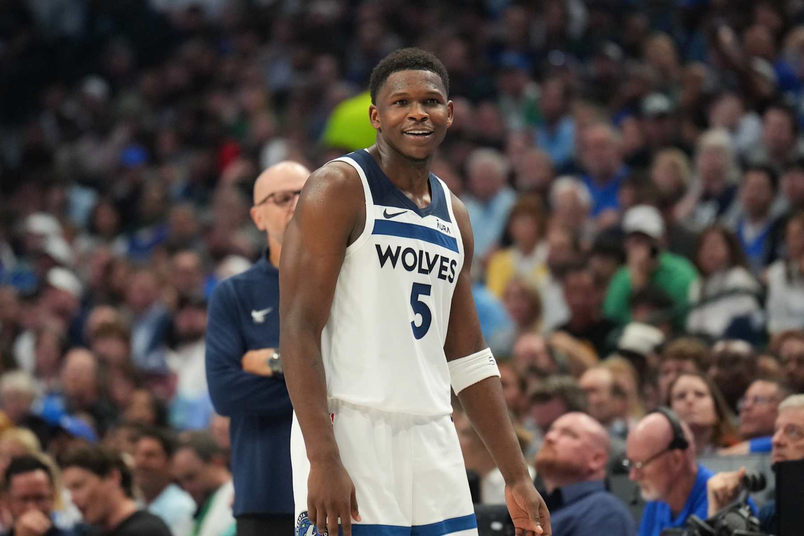 DALLAS, TX - MAY 28:  Anthony Edwards #5 of the Minnesota Timberwolves smiles during the game against the Dallas Mavericks during Game 3 of the Western Conference Finals of the 2024 NBA Playoffs on May 28, 2024 at the American Airlines Center in Dallas, Texas. NOTE TO USER: User expressly acknowledges and agrees that, by downloading and or using this photograph, User is consenting to the terms and conditions of the Getty Images License Agreement. Mandatory Copyright Notice: Copyright 2024 NBAE (Photo by Jesse D. Garrabrant/NBAE via Getty Images)