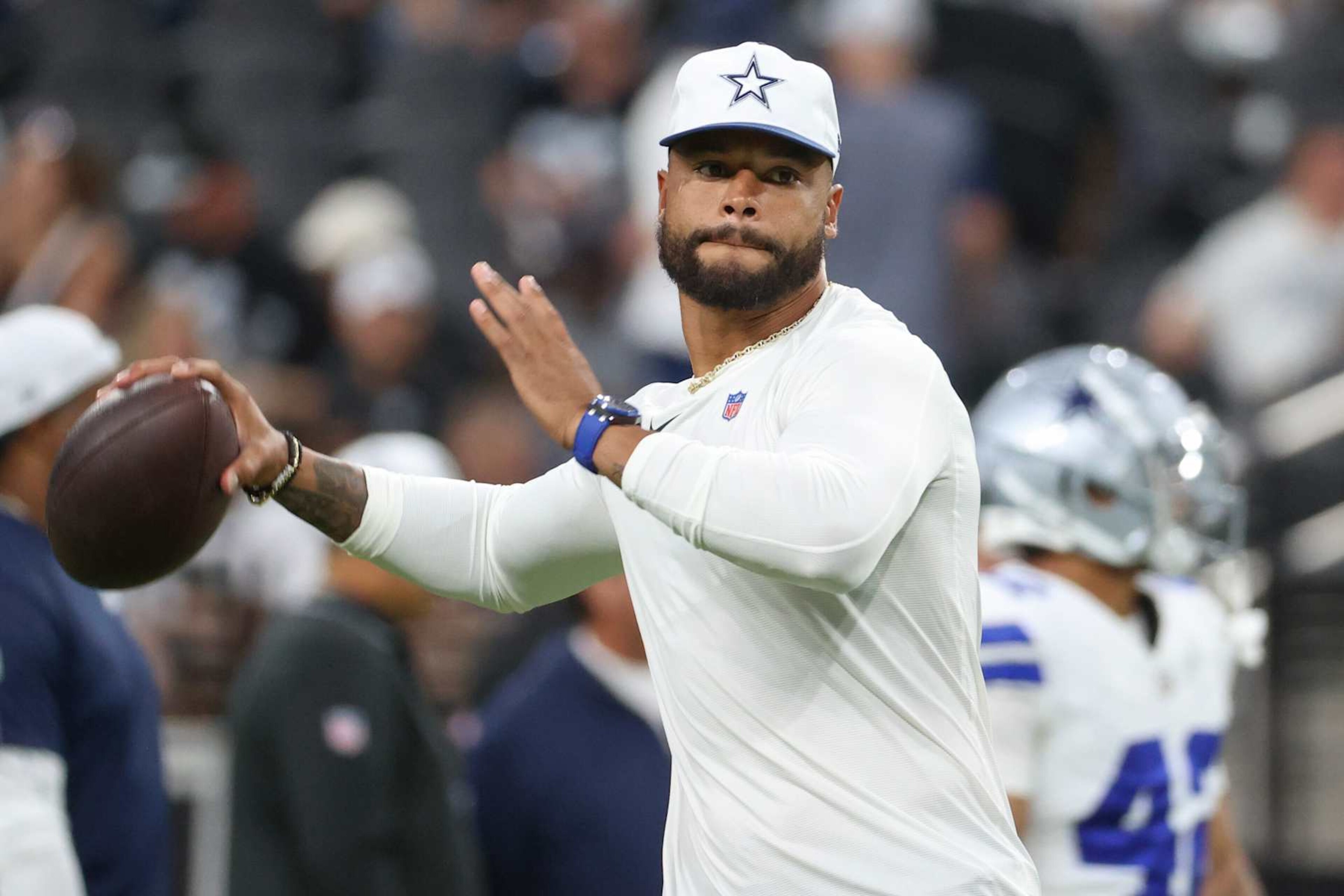 LAS VEGAS, NEVADA - AUGUST 17: Dak Prescott #4 of the Dallas Cowboys throws warm-up drills prior to a preseason game against the Las Vegas Raiders at Allegiant Stadium on August 17, 2024 in Las Vegas, Nevada. (Photo by Ian Maule/Getty Images)