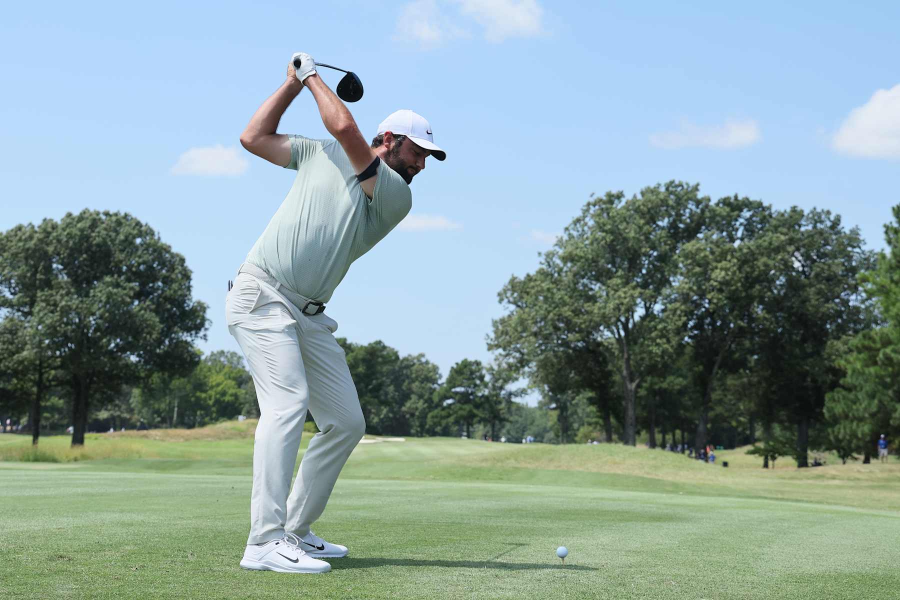 MEMPHIS, TENNESSEE - AUGUST 18: Scottie Scheffler of the United States plays his shot from the second tee during the final round of the FedEx St. Jude Championship at TPC Southwind on August 18, 2024 in Memphis, Tennessee. (Photo by Andy Lyons/Getty Images)