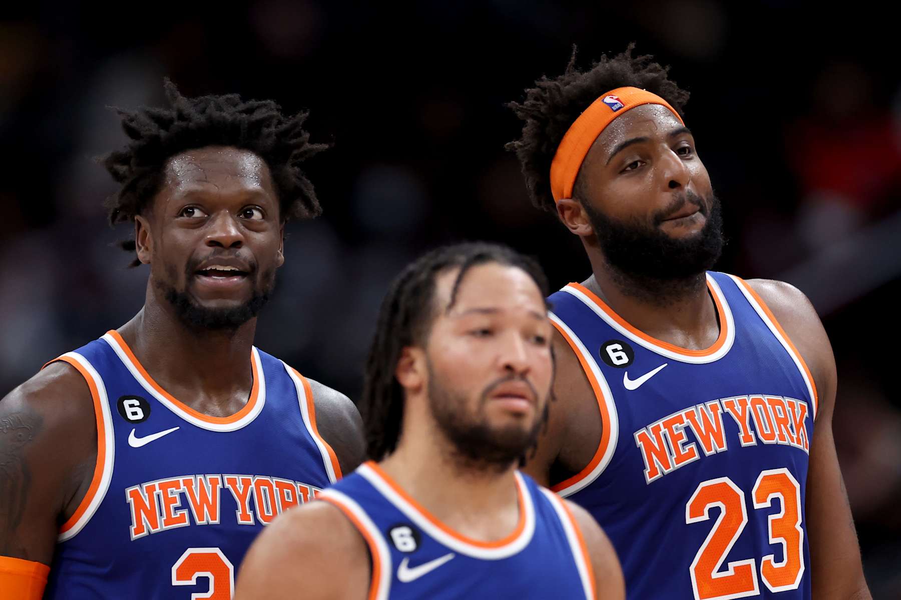 WASHINGTON, DC - JANUARY 13: Julius Randle #30, Jalen Brunson #11, and Mitchell Robinson #23 of the New York Knicks look on in the second half against the Washington Wizards at Capital One Arena on January 13, 2023 in Washington, DC. NOTE TO USER: User expressly acknowledges and agrees that, by downloading and or using this photograph, User is consenting to the terms and conditions of the Getty Images License Agreement. (Photo by Rob Carr/Getty Images)
