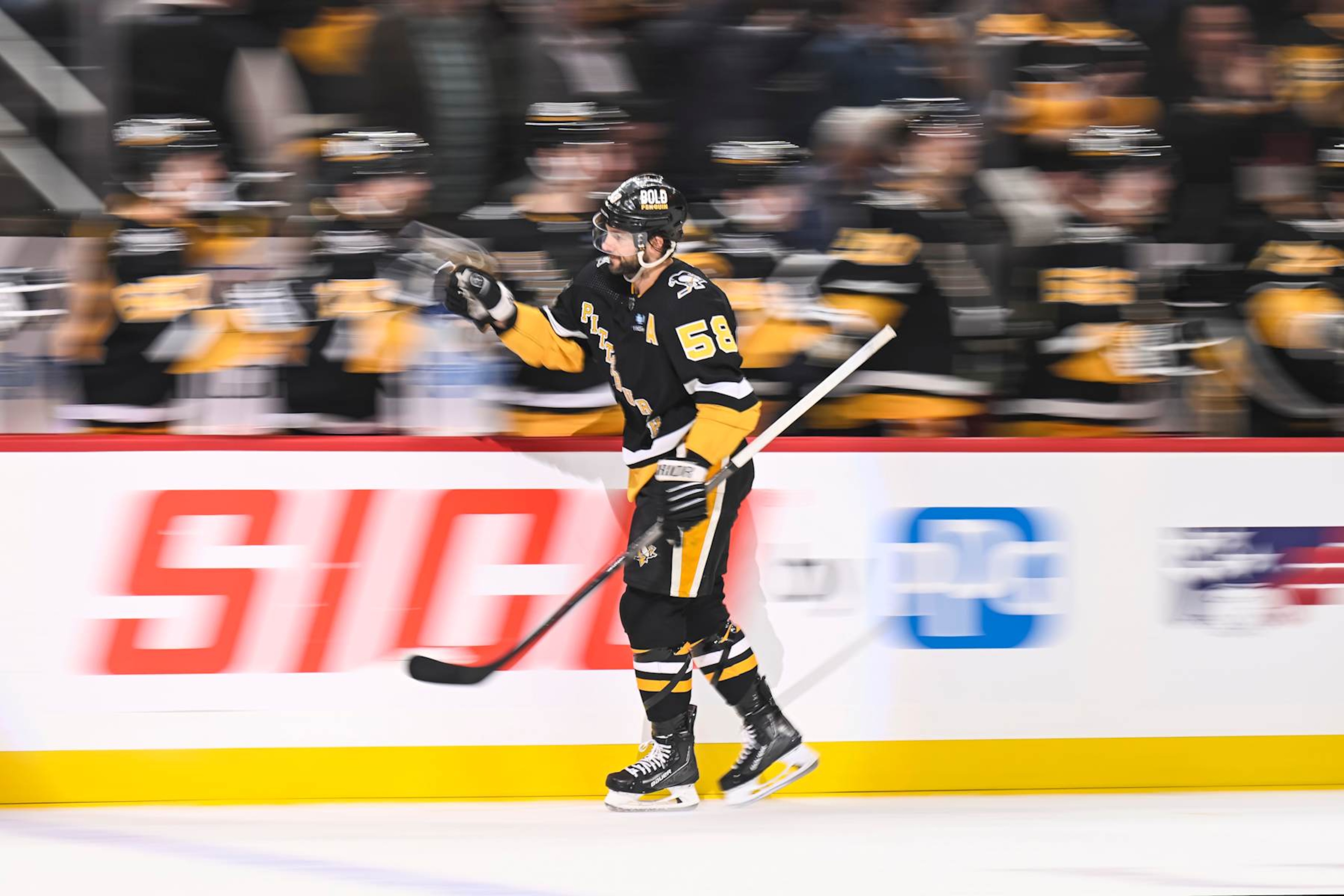 PITTSBURGH, PA - FEBRUARY 22: Pittsburgh Penguins defenseman Kris Letang (58) celebrates his goal with the bench during the first period in the NHL game between the Pittsburgh Penguins and the Montreal Canadiens on February 22, 2024, at PPG Paints Arena in Pittsburgh, PA. (Photo by Jeanine Leech/Icon Sportswire via Getty Images) PITTSBURGH, PA - FEBRUARY 22: Pittsburgh Penguins defenseman Kris Letang (58) celebrates his goal with the bench during the first period in the NHL game between the Pittsburgh Penguins and the Montreal Canadiens on February 22, 2024, at PPG Paints Arena in Pittsburgh, PA. (Photo by Jeanine Leech/Icon Sportswire via Getty Images)