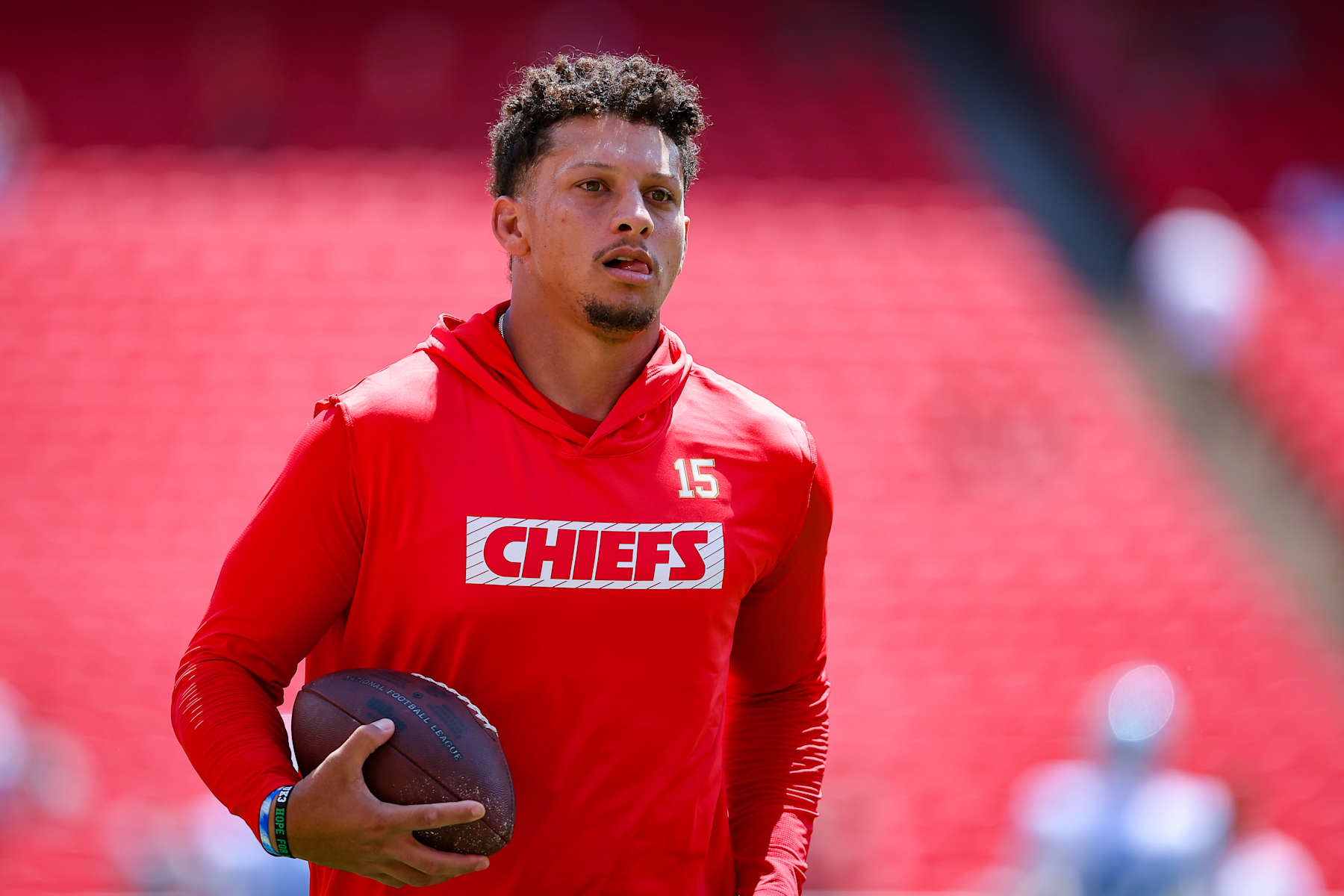 KANSAS CITY, MISSOURI - AUGUST 17: Patrick Mahomes #15 of the Kansas City Chiefs runs on the field during pregame warmups prior to a preseason game against the Detroit Lions at GEHA Field at Arrowhead Stadium on August 17, 2024 in Kansas City, Missouri. (Photo by David Eulitt/Getty Images)