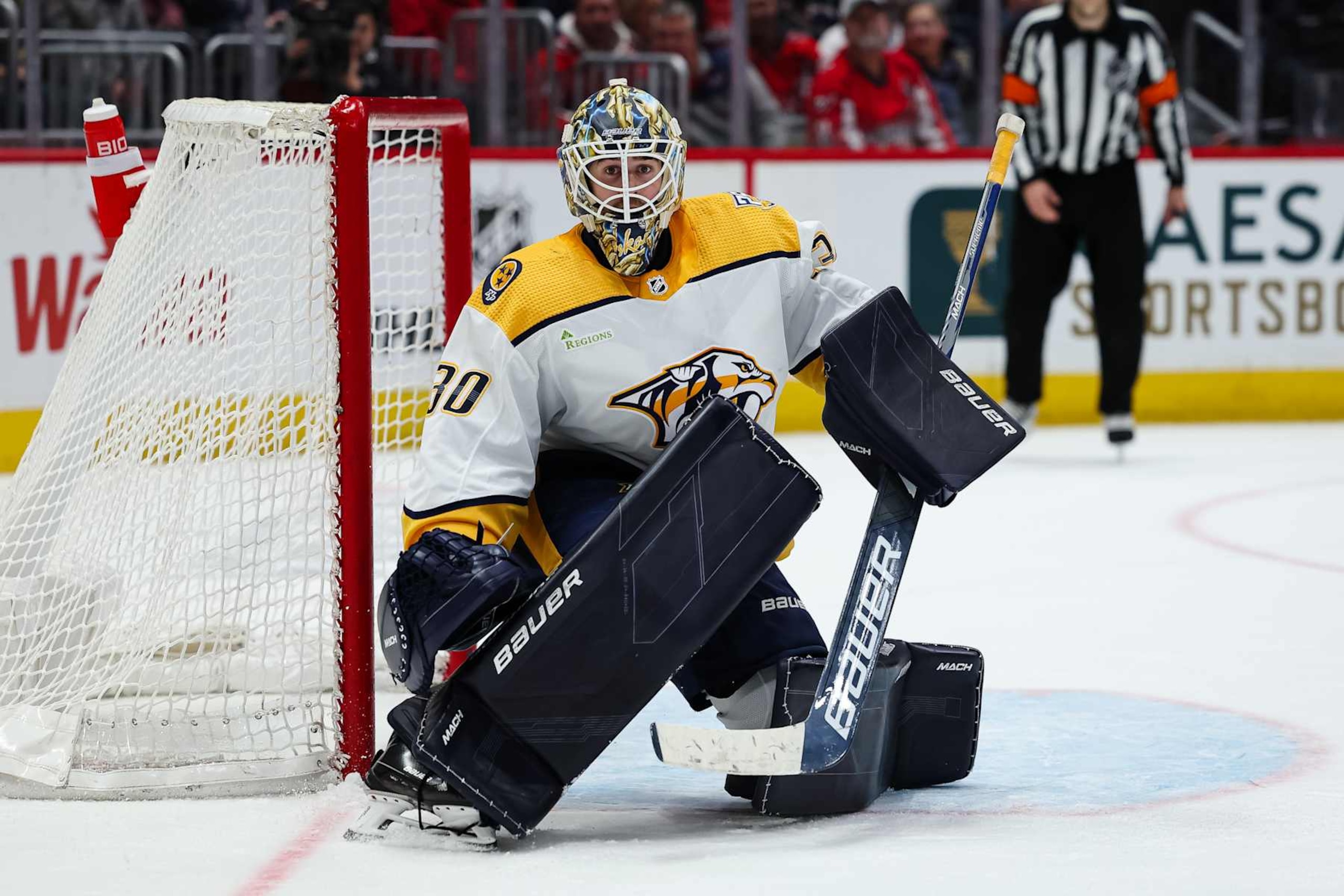 WASHINGTON, DC - DECEMBER 30: Yaroslav Askarov #30 of the Nashville Predators tends net against the Washington Capitals during overtime in the game at Capital One Arena on December 30, 2023 in Washington, DC. (Photo by Scott Taetsch/Getty Images)