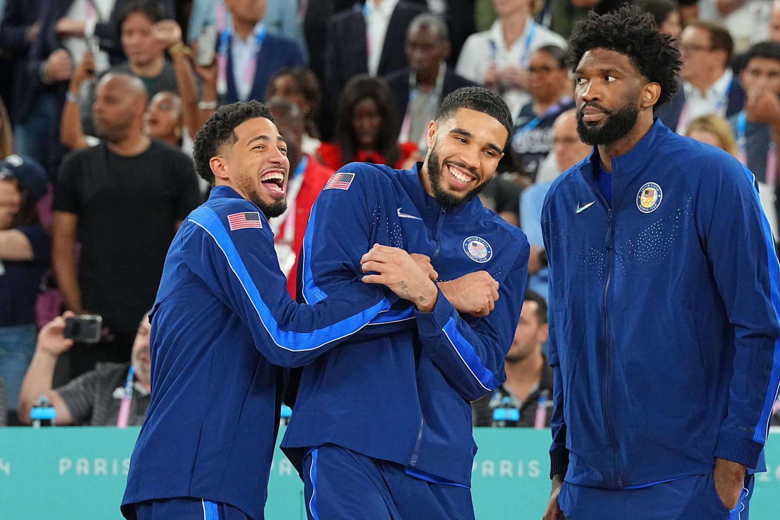 Basketball: 2024 Summer Olympics: Team USA (L-R) Tyrese Haliburton, Jayson Tatum, and Joel Embiid victorious on court after winning Gold Medal Game vs France at Bercy Arena.
Paris, France 8/10/2024
CREDIT: Erick W. Rasco (Photo by Erick W. Rasco /Sports Illustrated via Getty Images) 
(Set Number: X164583 TK1)