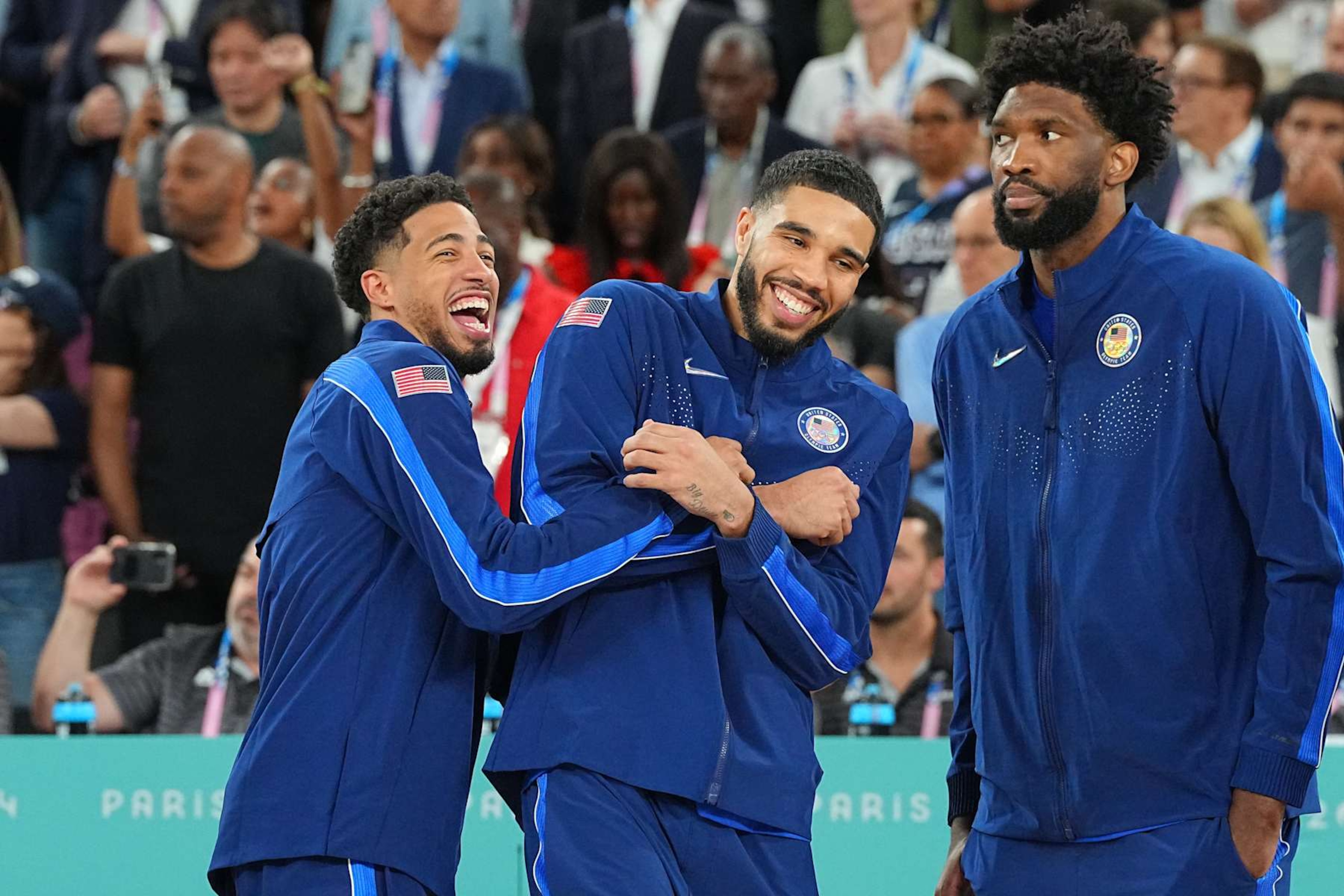 Basketball: 2024 Summer Olympics: Team USA (L-R) Tyrese Haliburton, Jayson Tatum, and Joel Embiid victorious on court after winning Gold Medal Game vs France at Bercy Arena.
Paris, France 8/10/2024
CREDIT: Erick W. Rasco (Photo by Erick W. Rasco /Sports Illustrated via Getty Images) 
(Set Number: X164583 TK1)